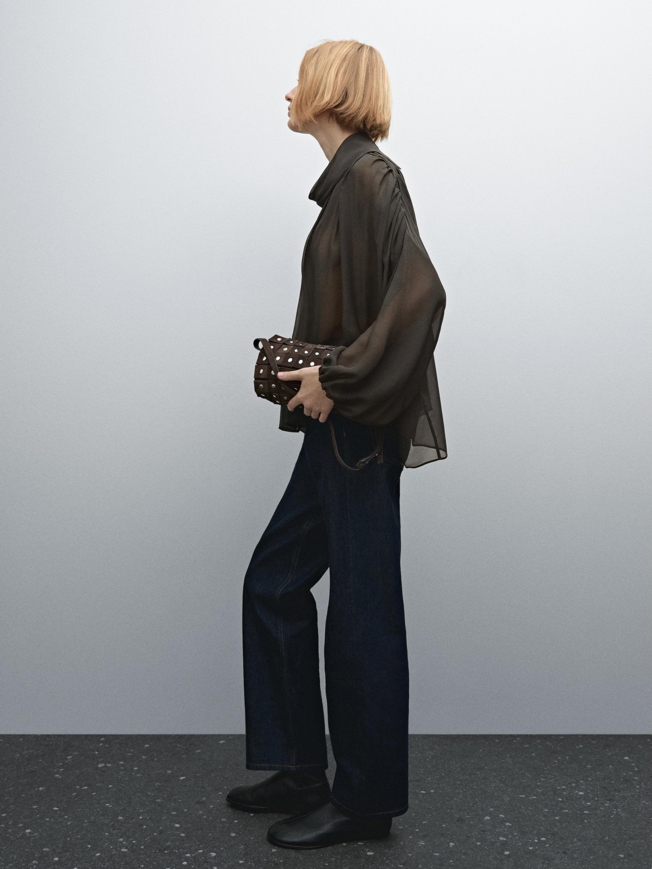 Voluminous flowing blouse with button details