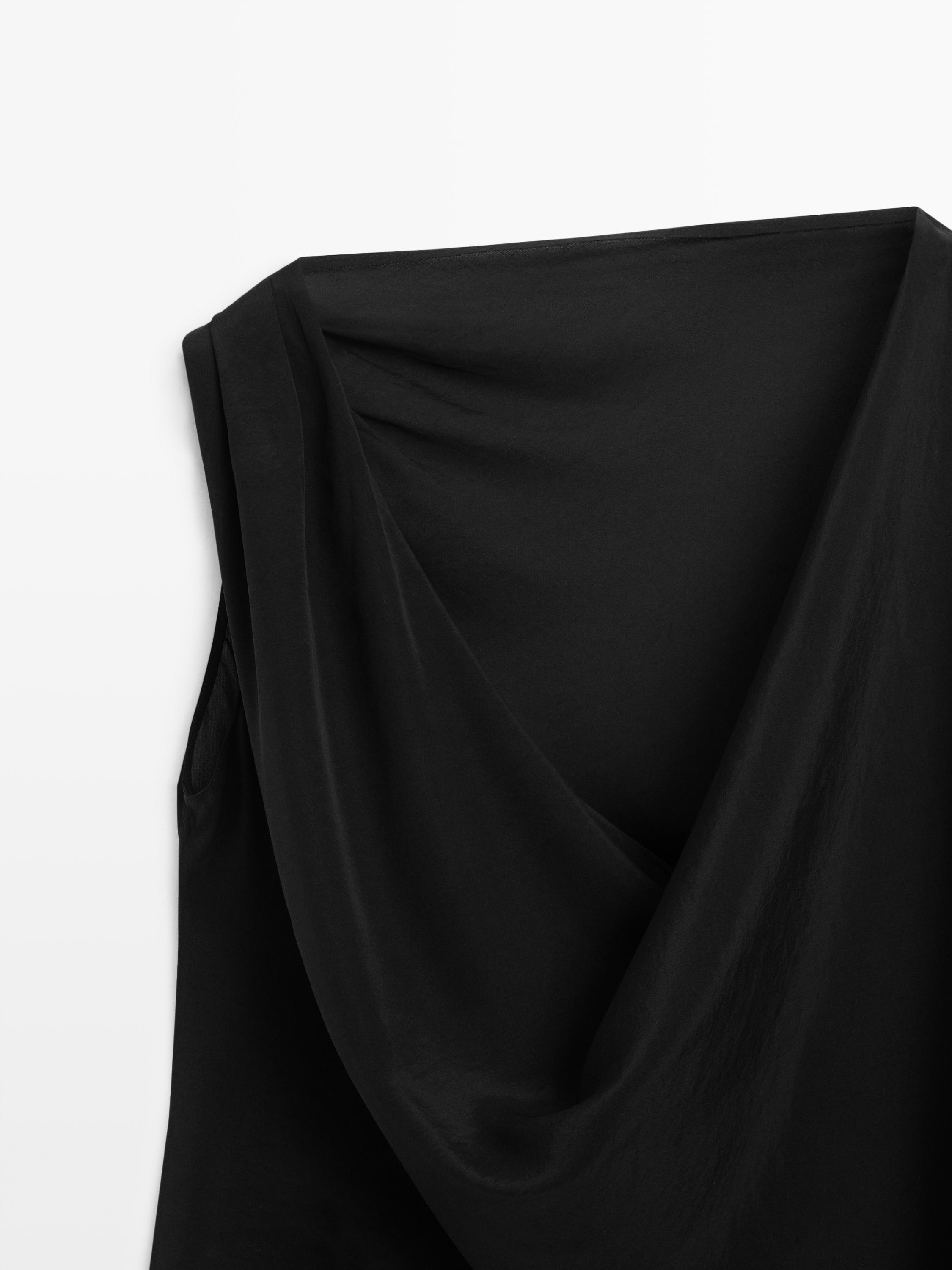 Top asimétrico semitransparente