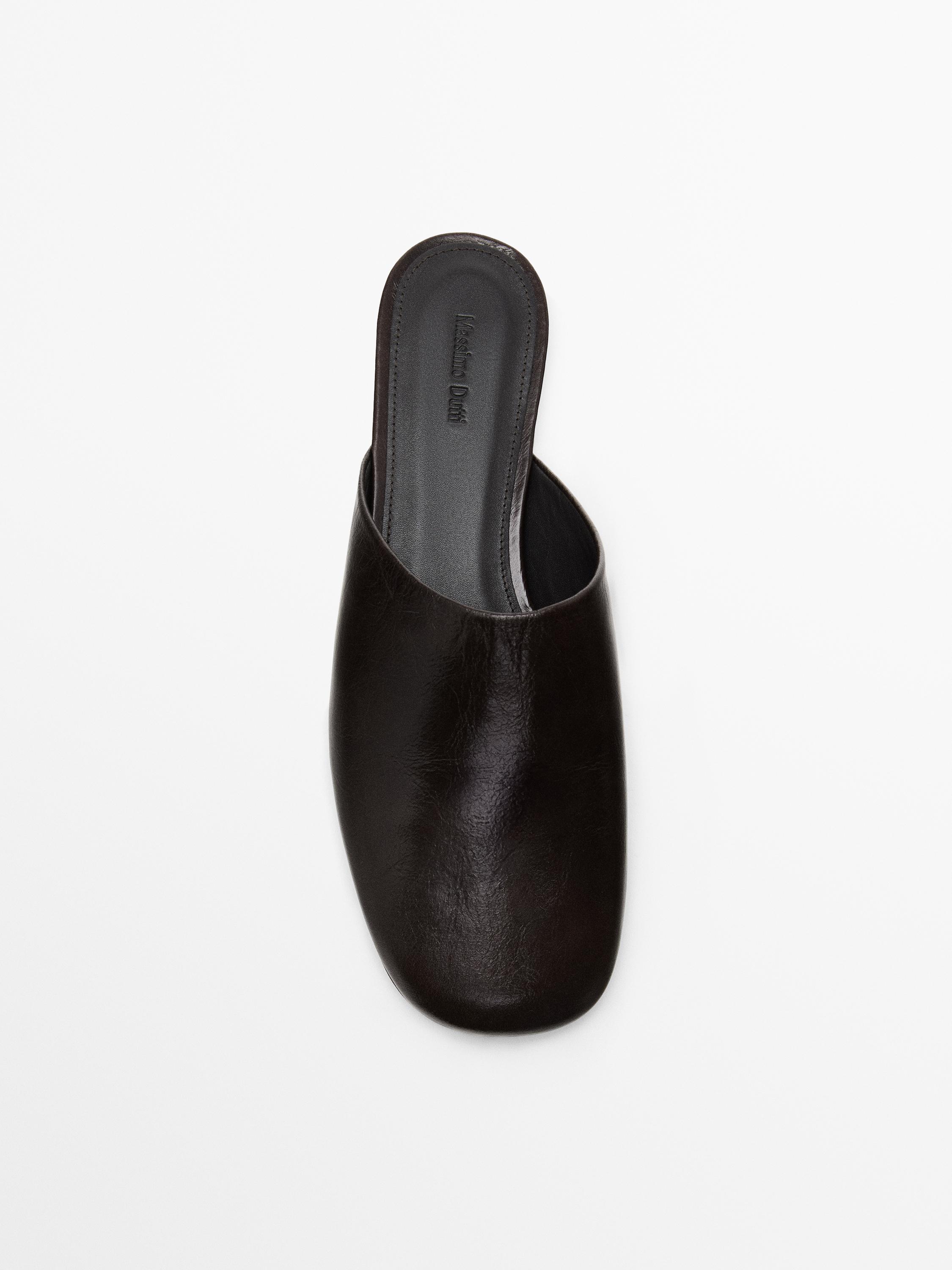 Flat leather mules