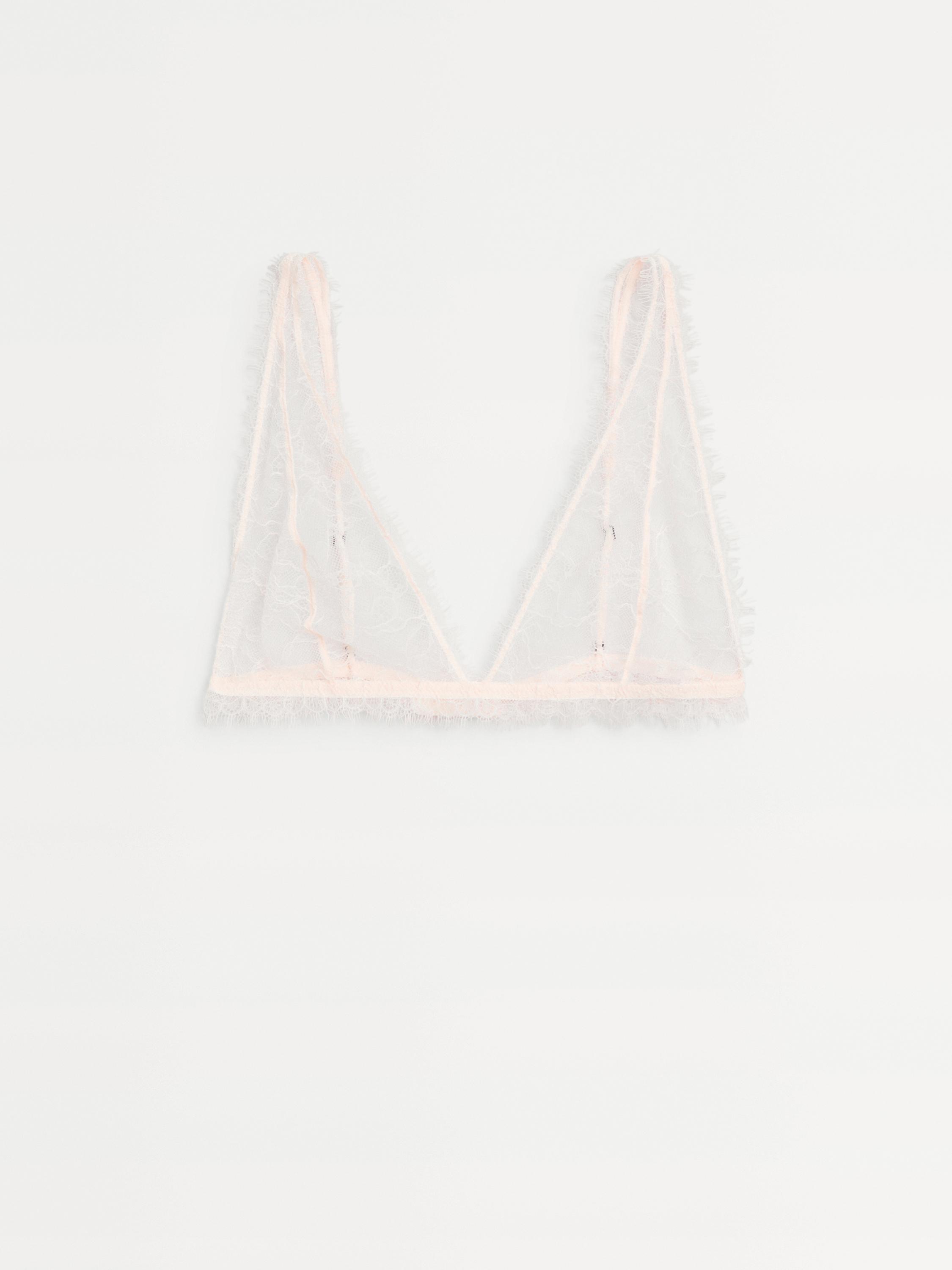 Vista frontal de bralette crudo con encaje transparente y tirantes finos.