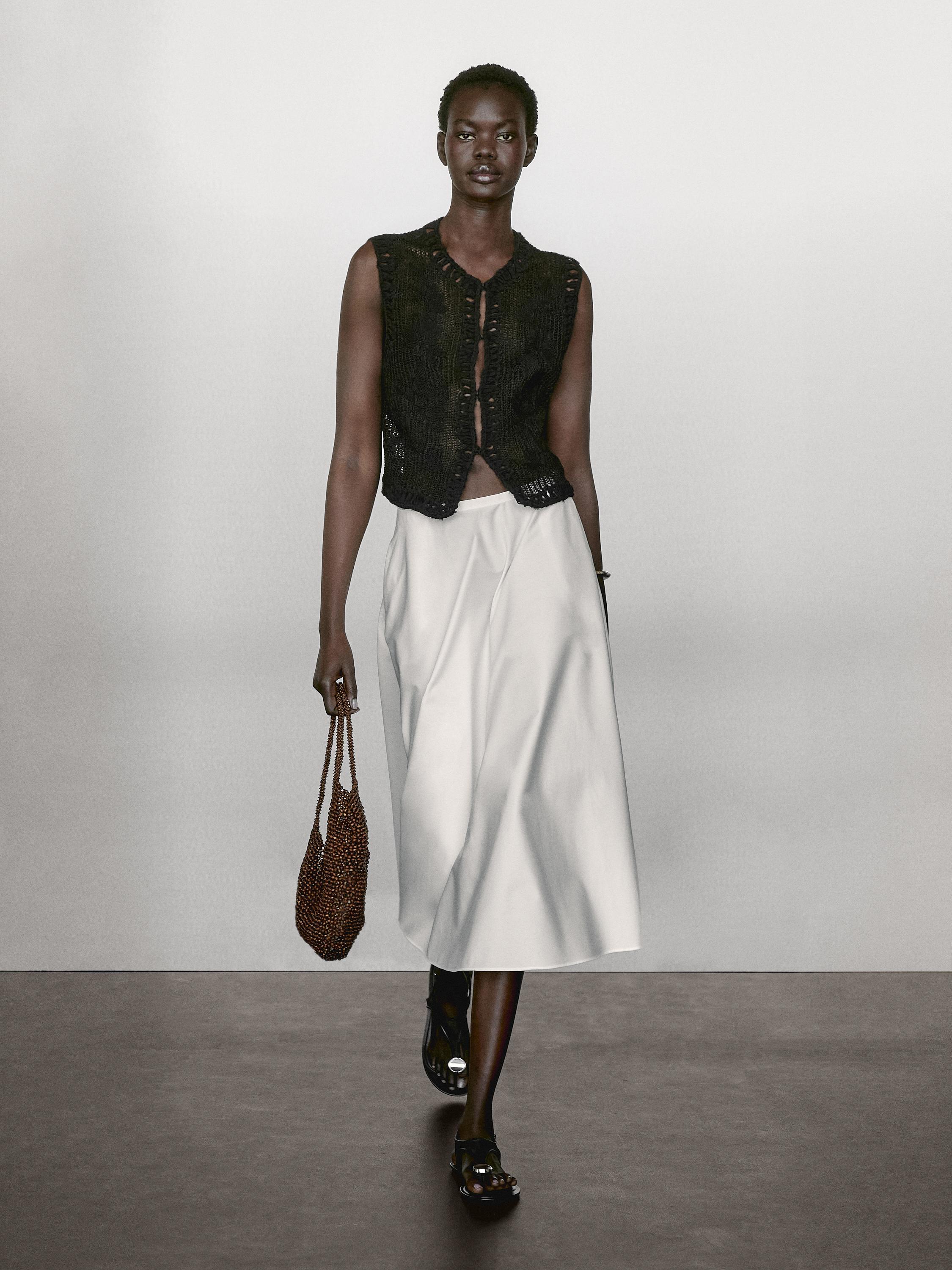 Knit vest with embroidered detail