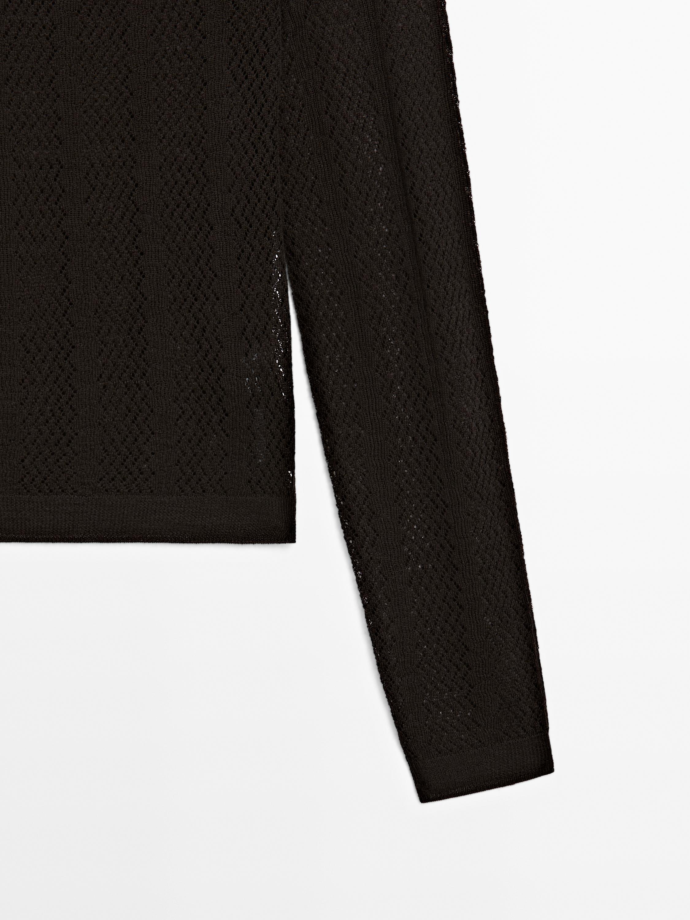 Cutwork wool blend sweater