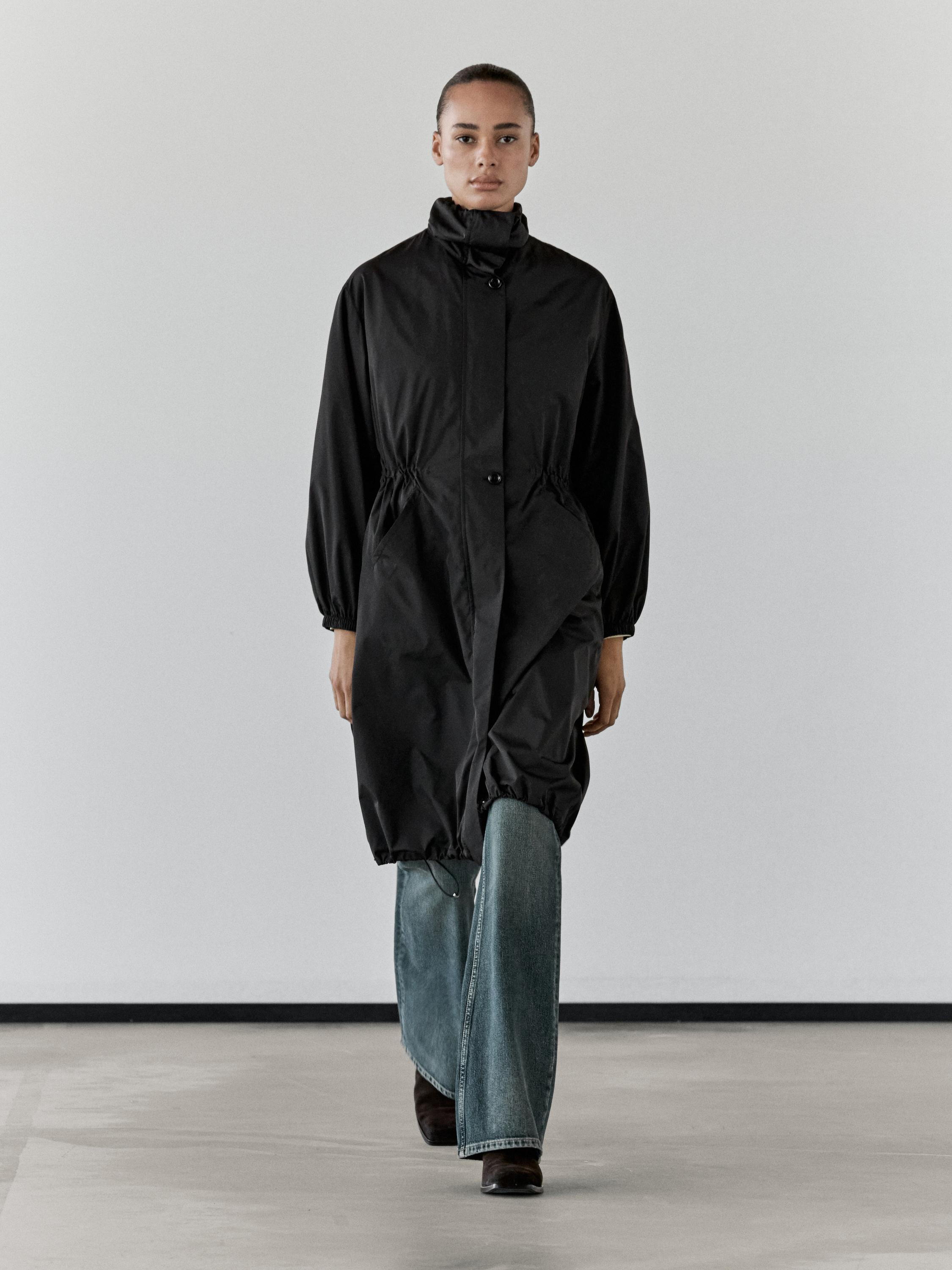 Water-repellent parka with detachable inner gilet