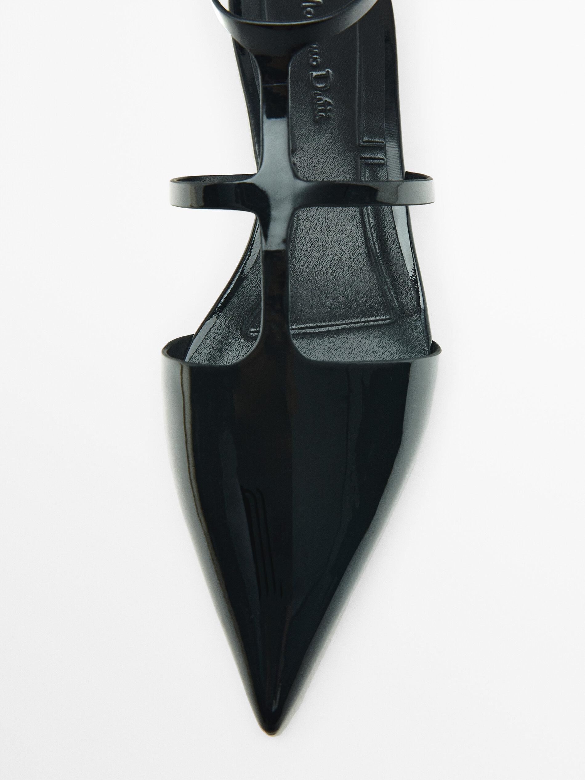 Mules plates ouvertes à l’arrière