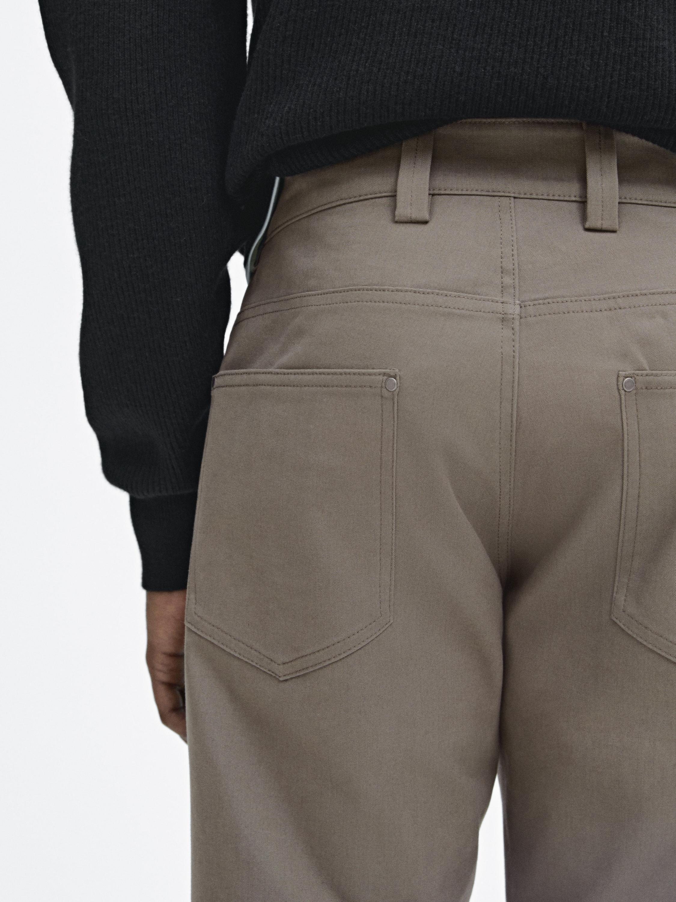 Cotton blend tapered fit jeans