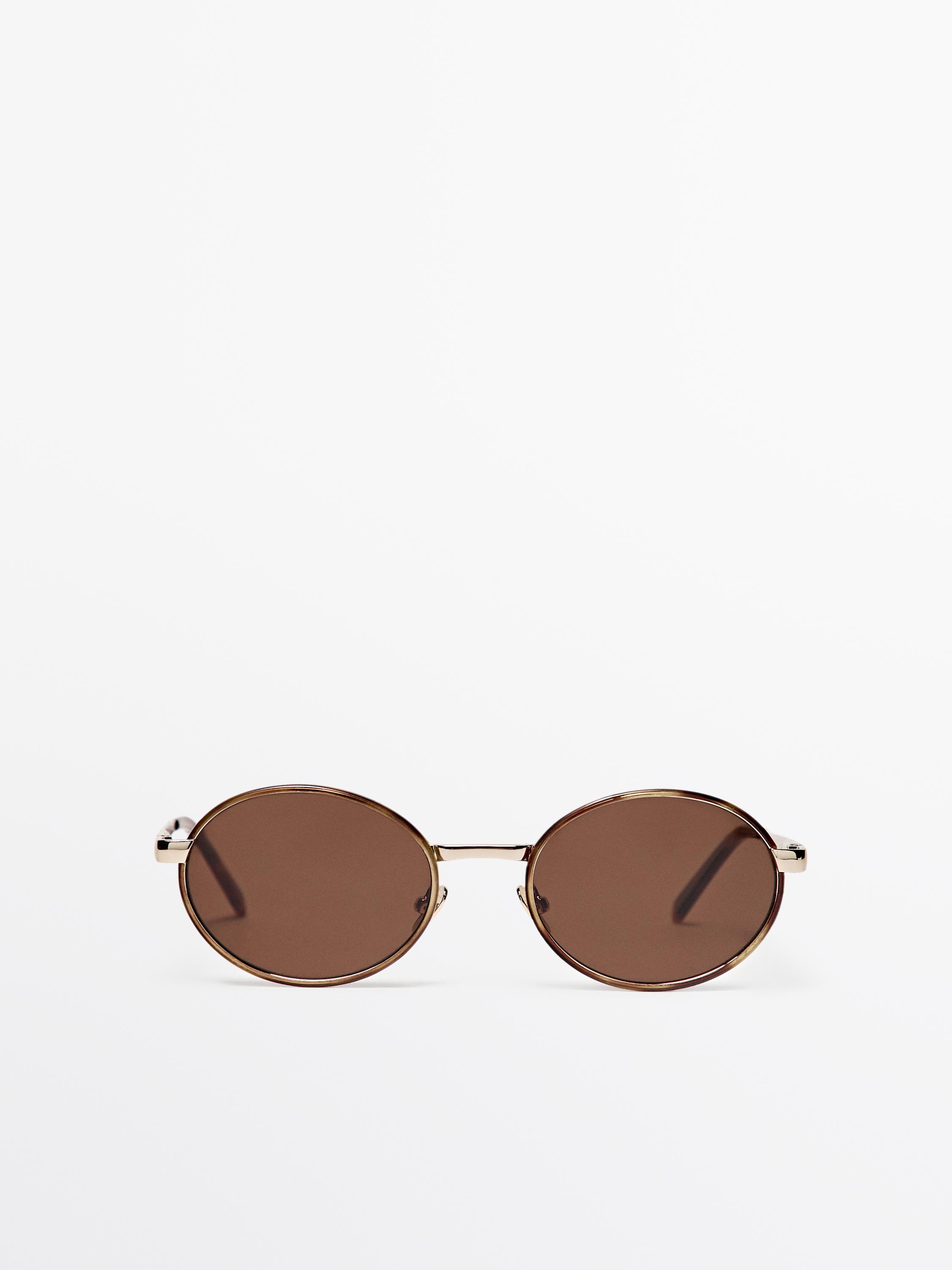 Lunettes de soleil rondes contrastantes
