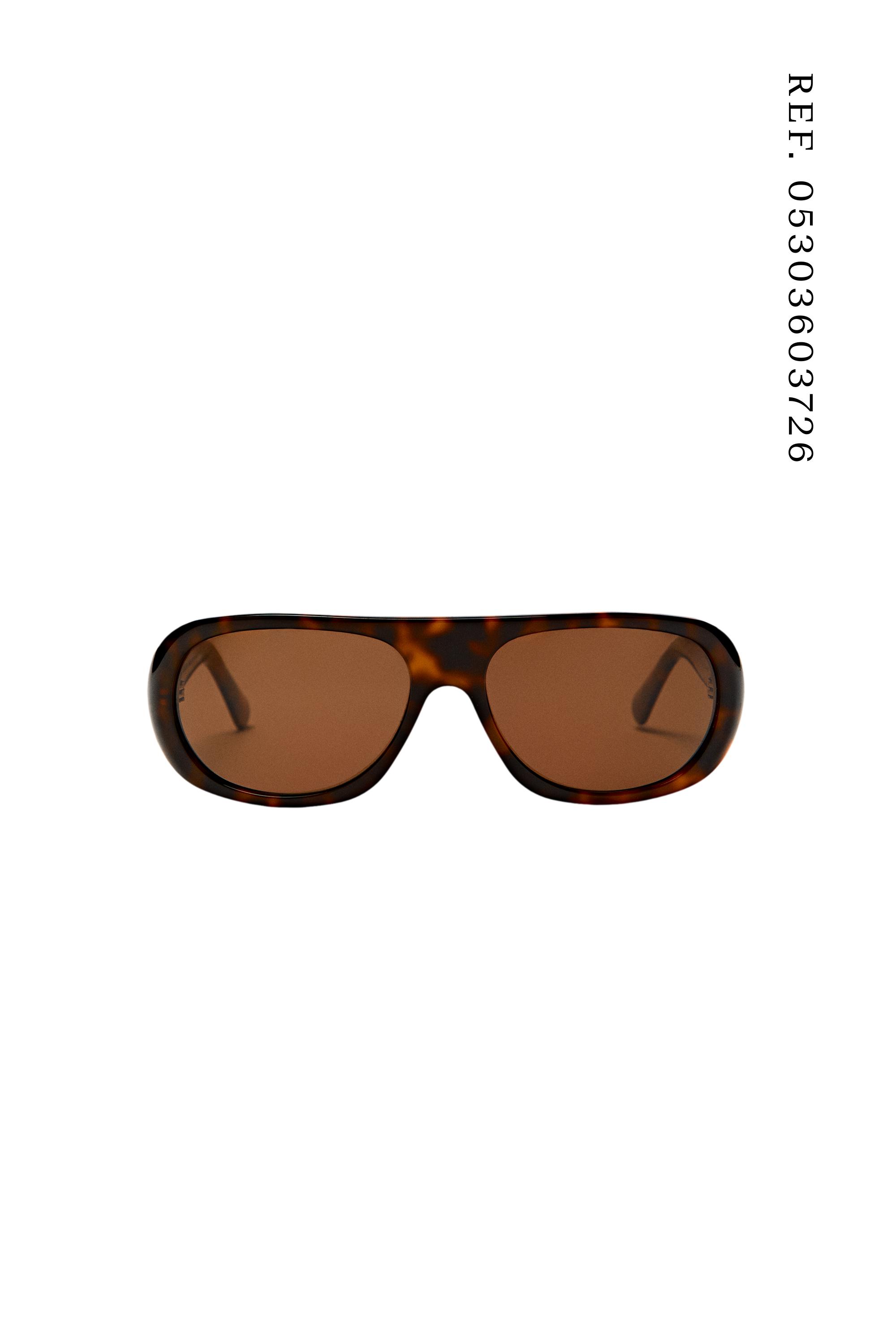 Oval tortoiseshell-effect sunglasses — BROWN