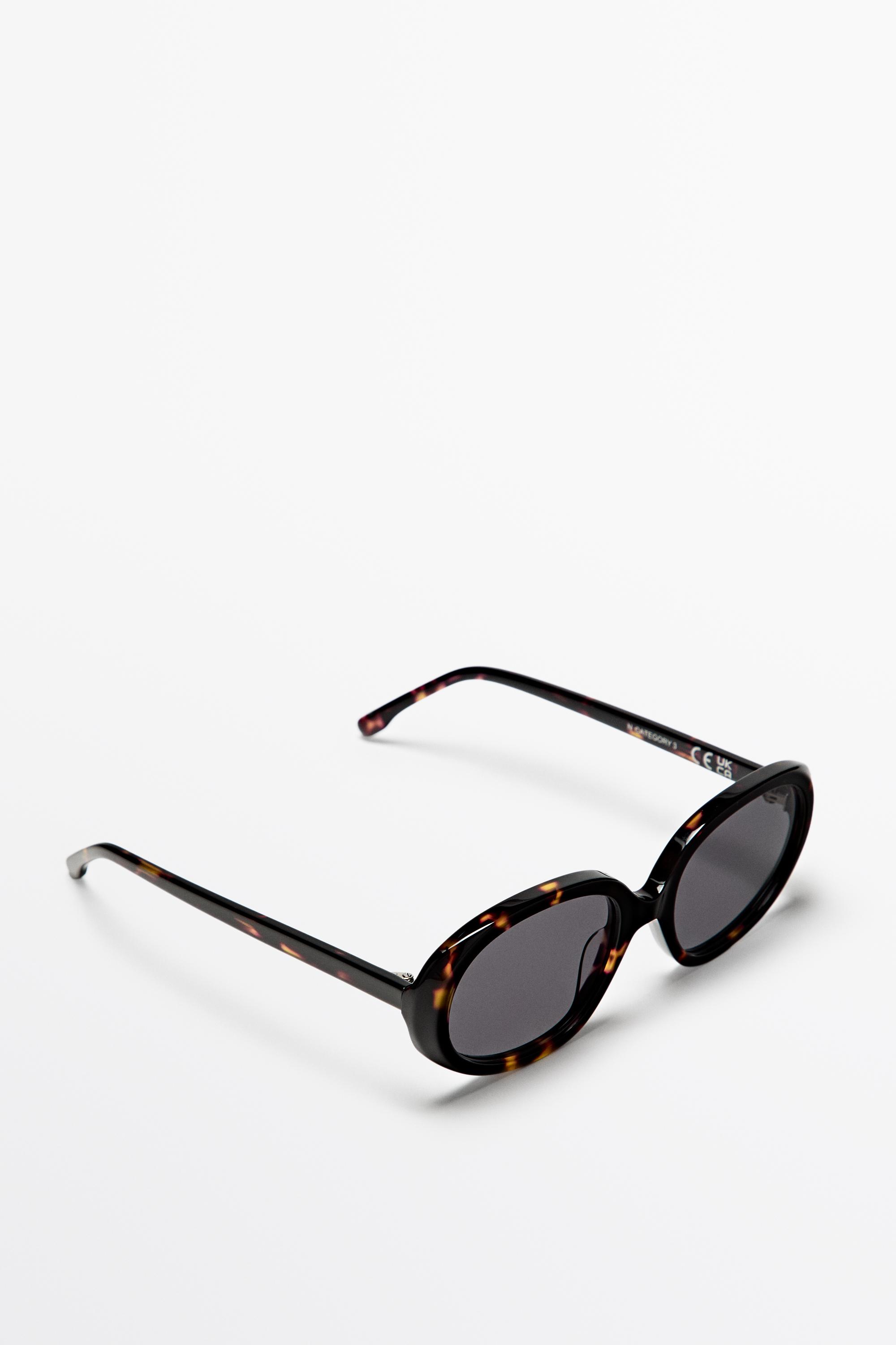 Oval tortoiseshell-effect sunglasses — BROWN