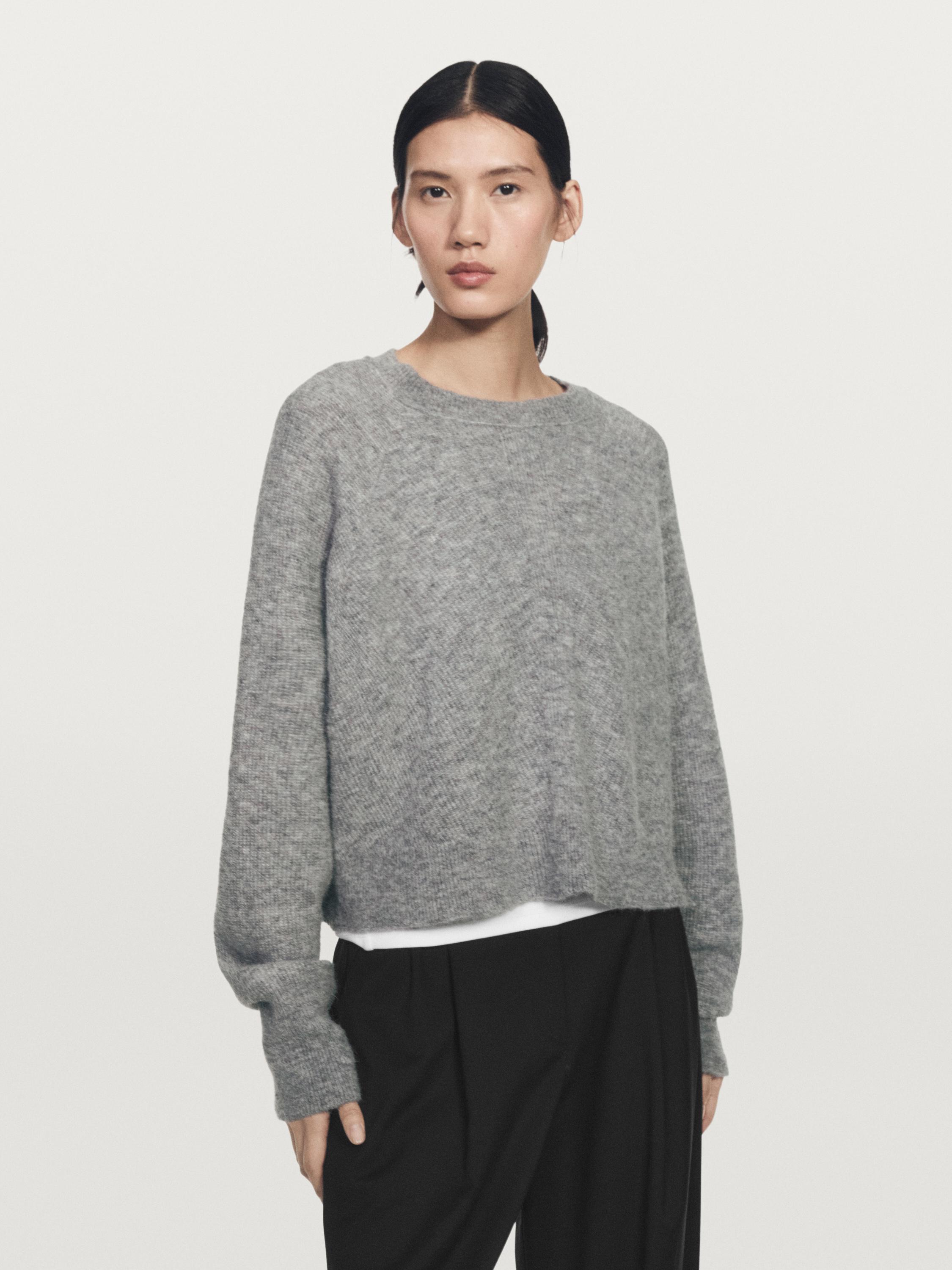 Extra-long sleeve oversize knit sweater