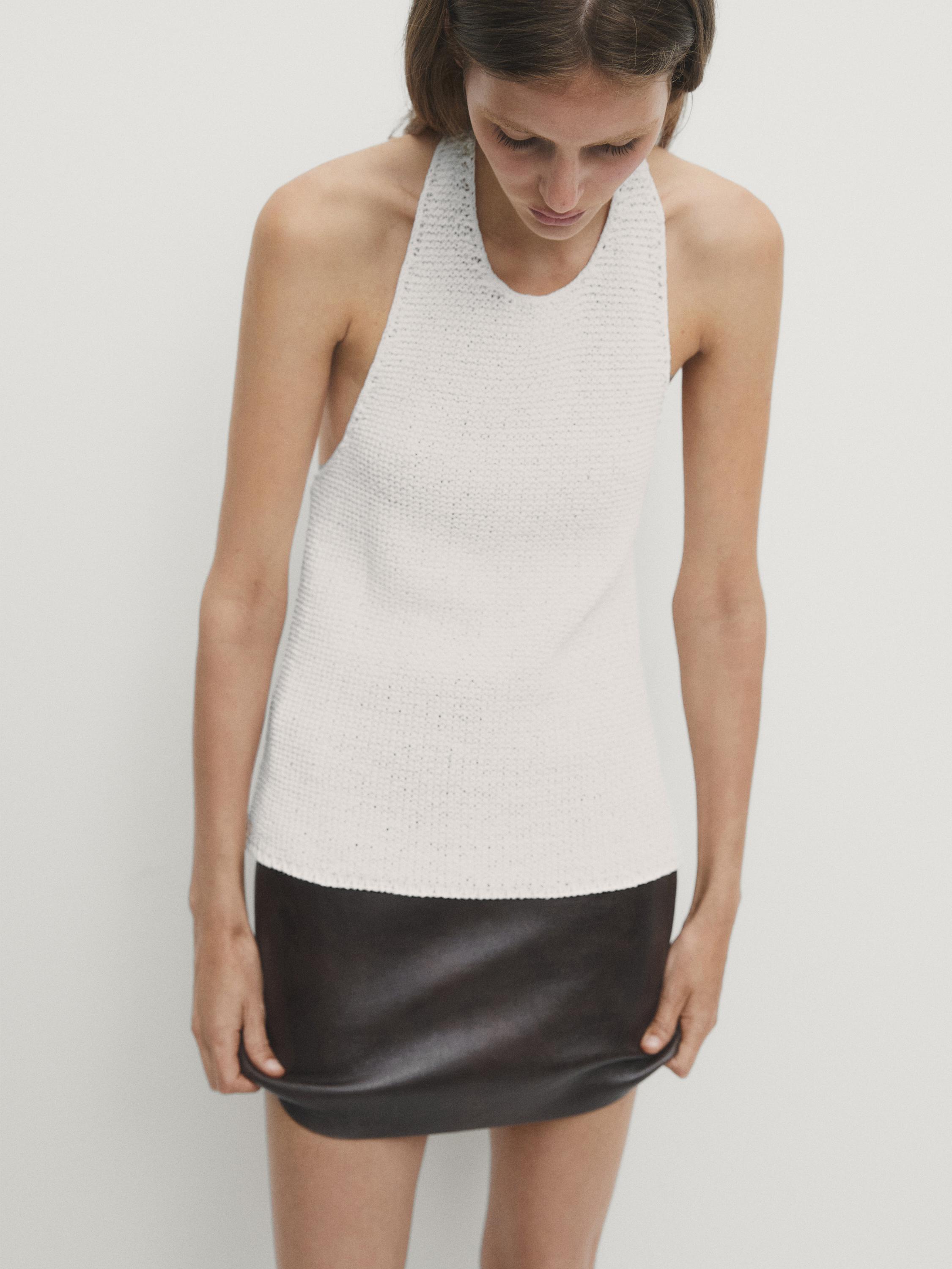 Halterneck top with low-cut back