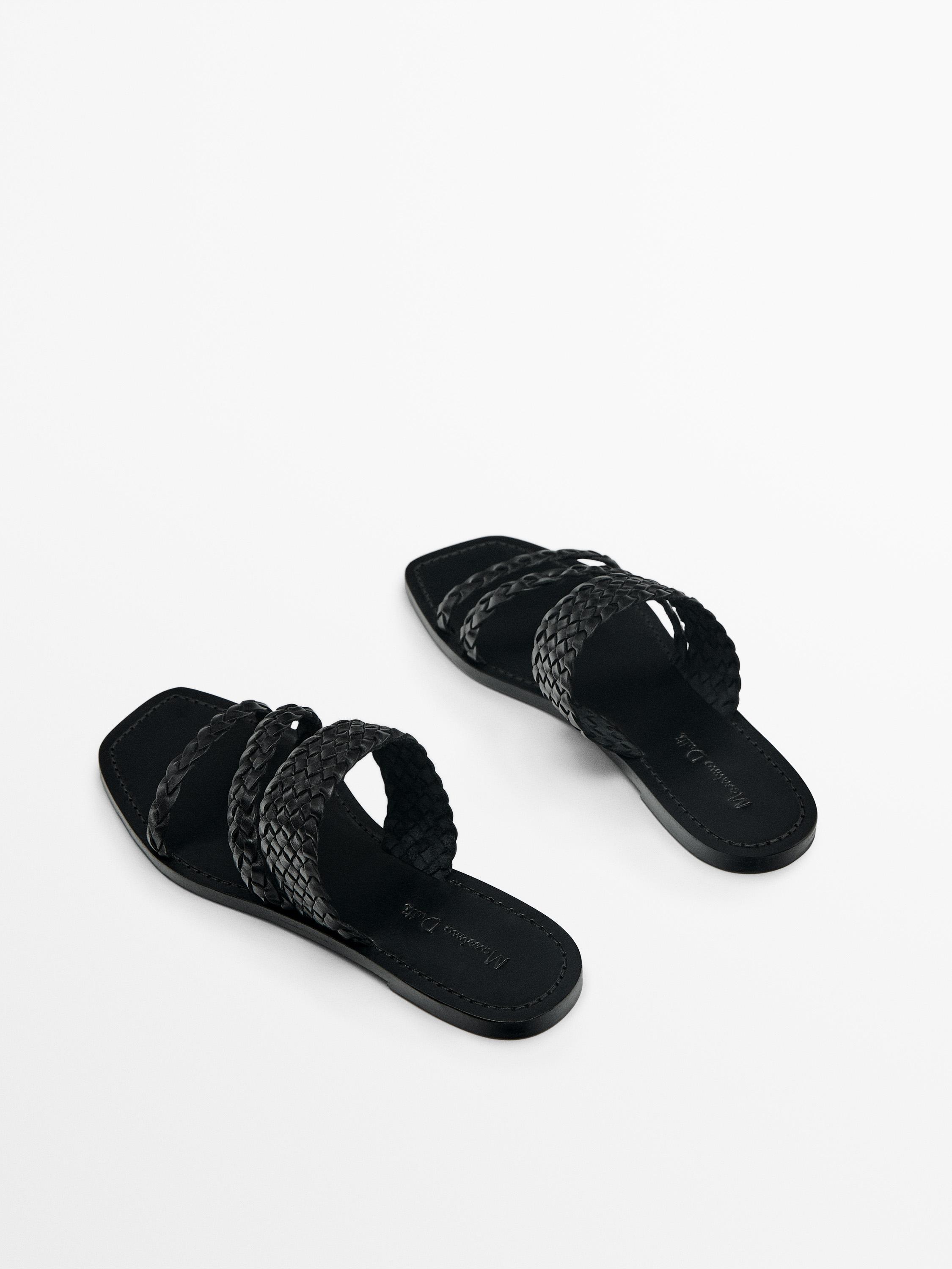 Flat slider sandals with woven straps