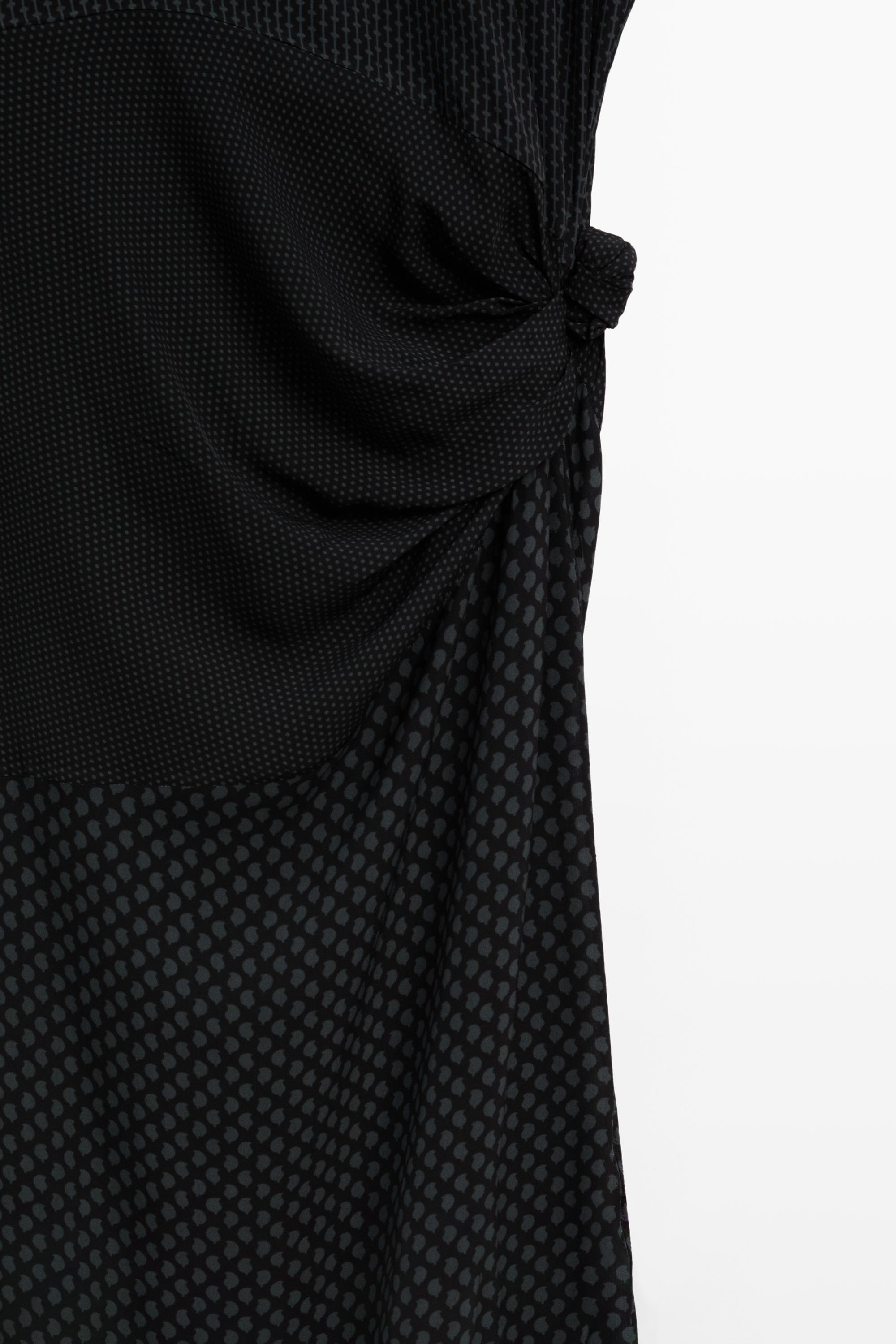 Long flowing printed dress with knot detail — BLACK