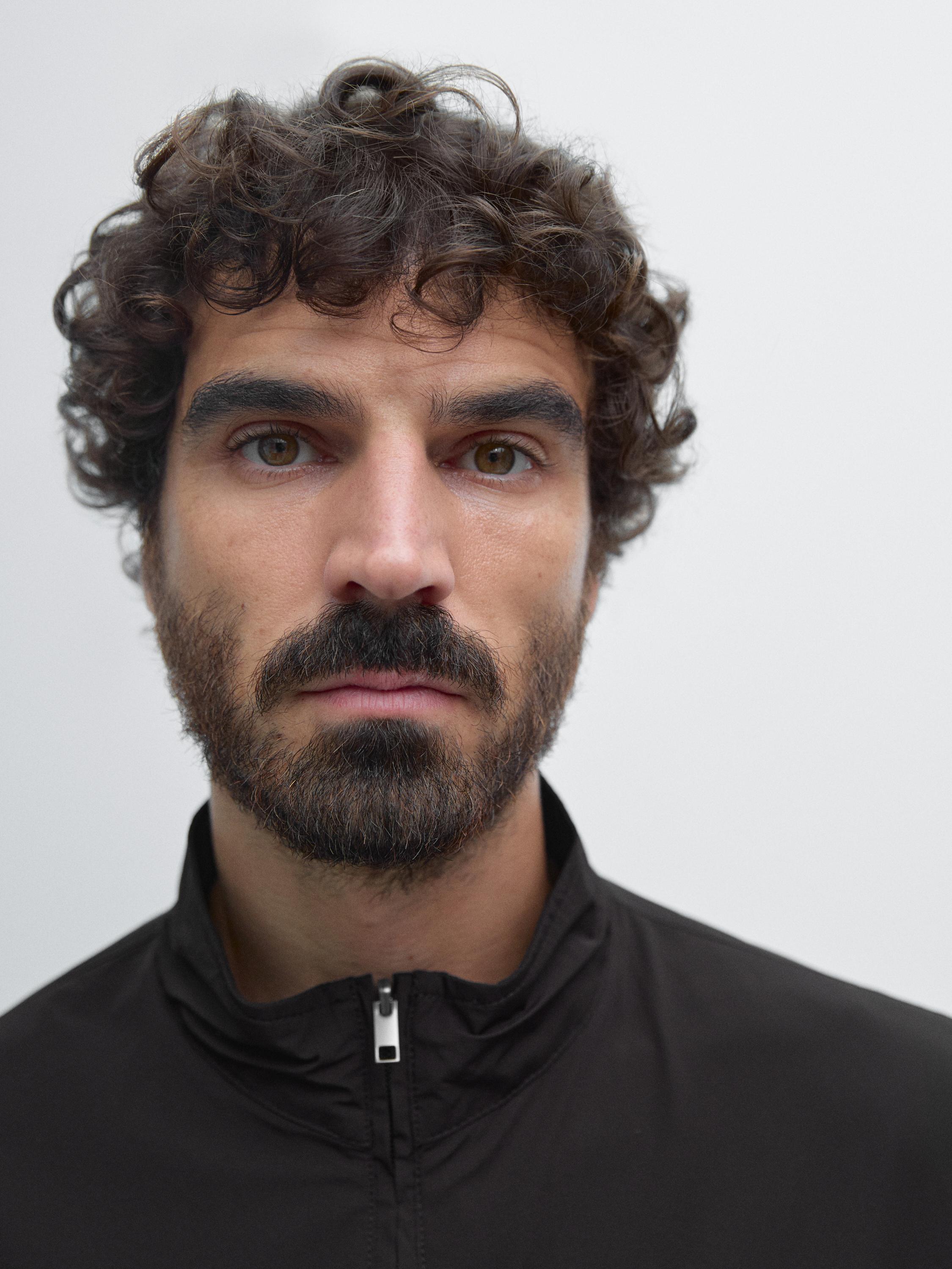 Reversible high neck jacket — BLACK