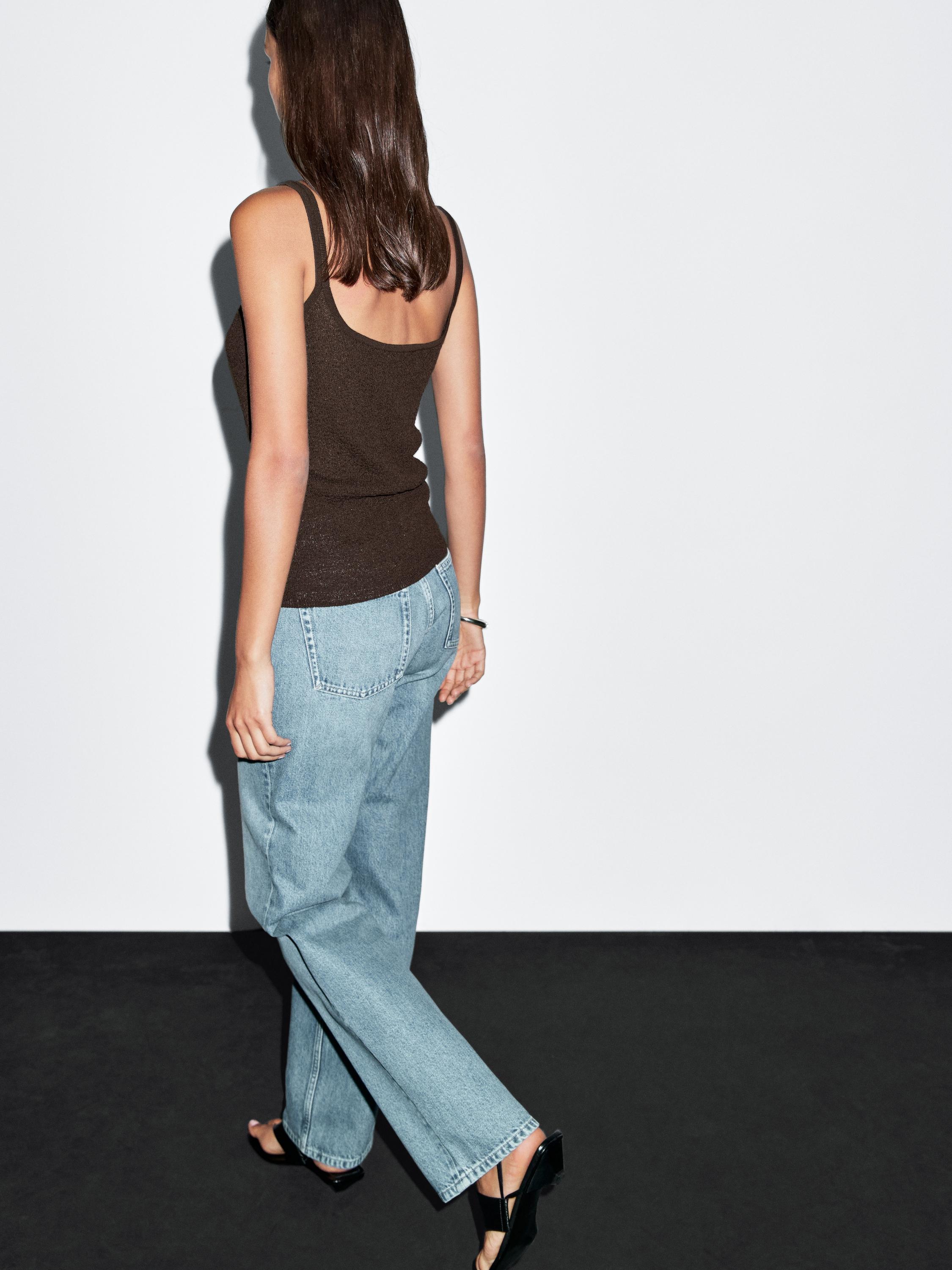 Flowing knit top with straps