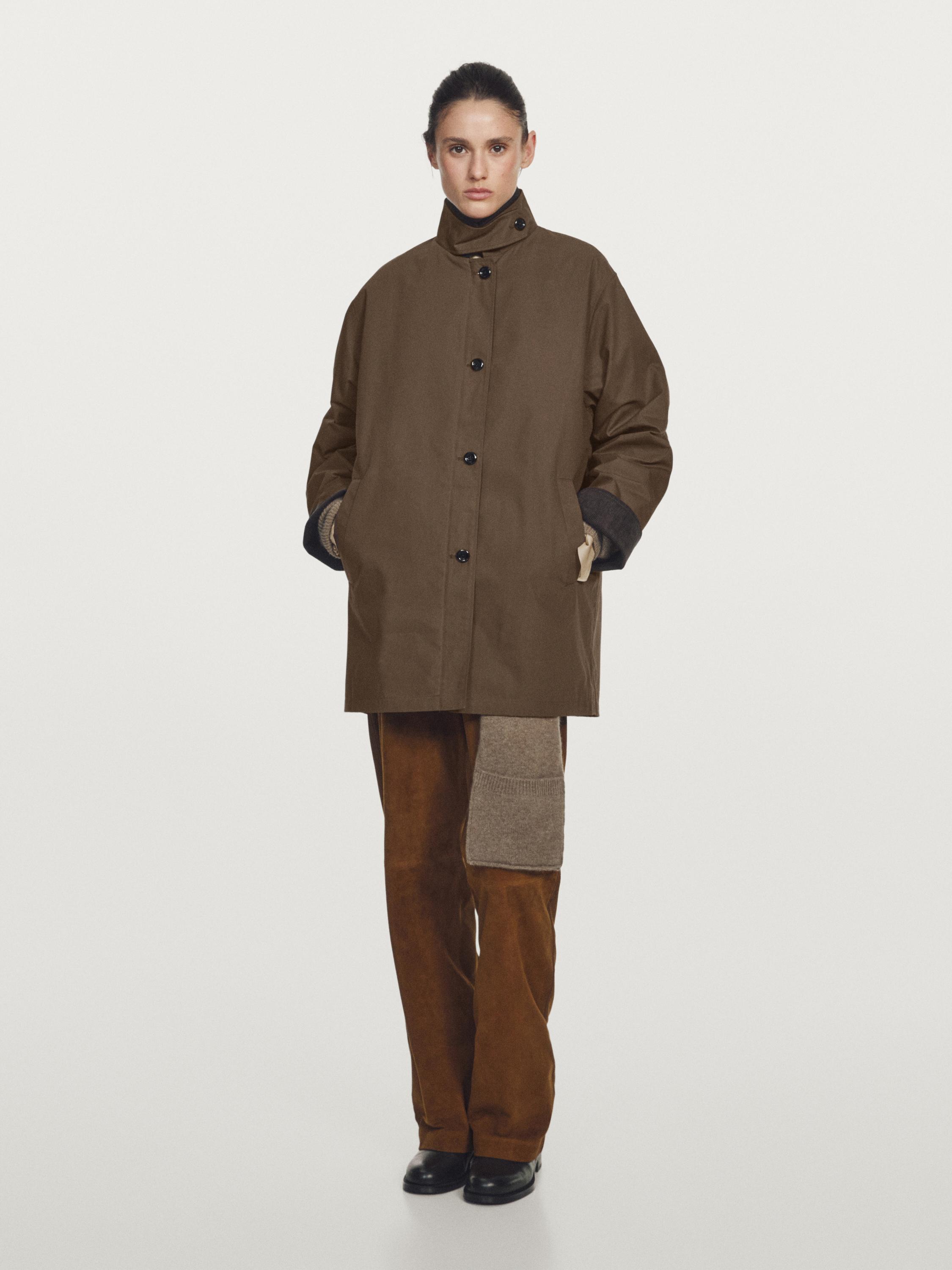 Waxed high neck parka with corduroy detail