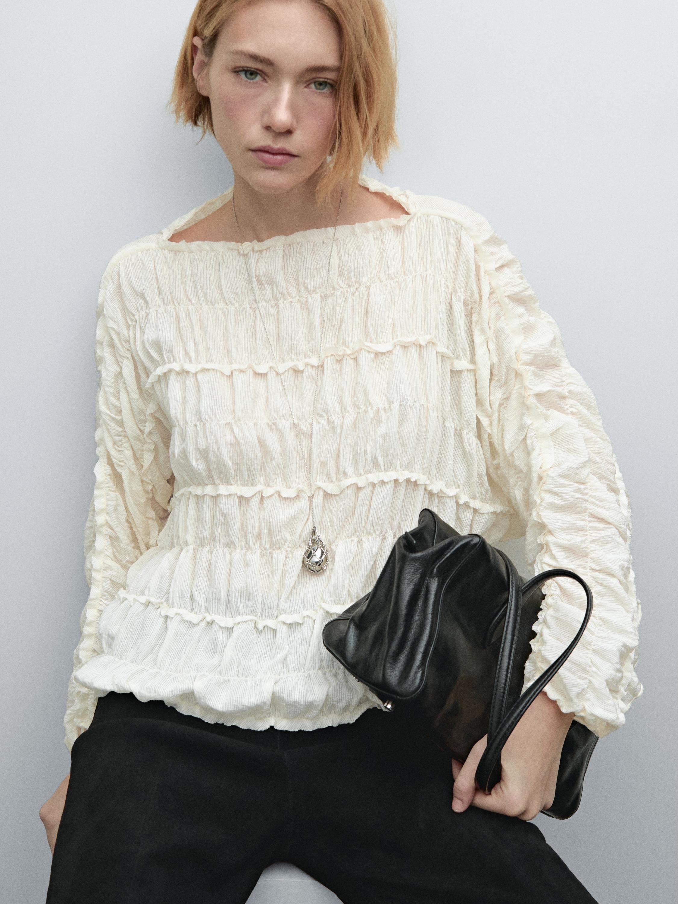 Flowing blouse with gathered detail
