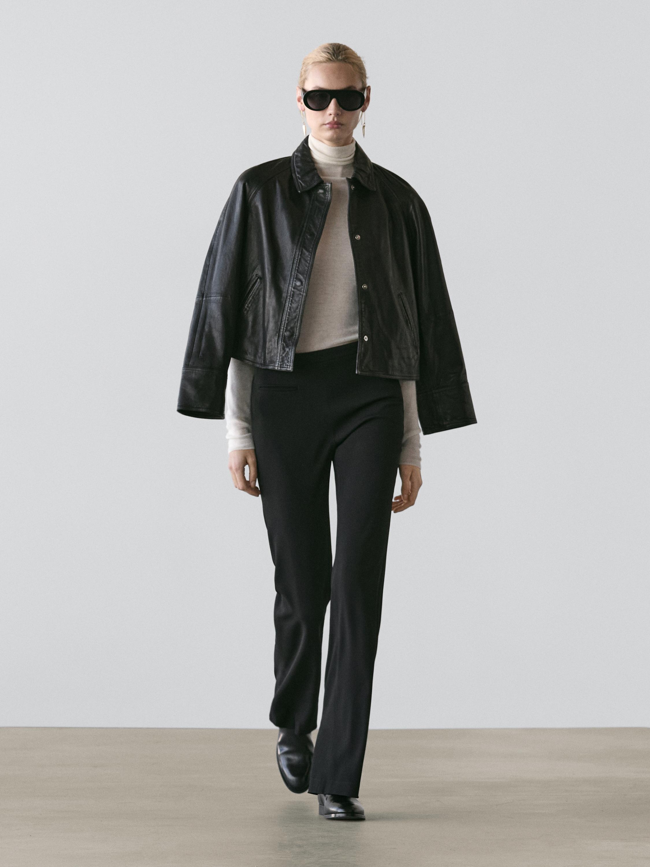Flared trousers with pocket — BLACK
