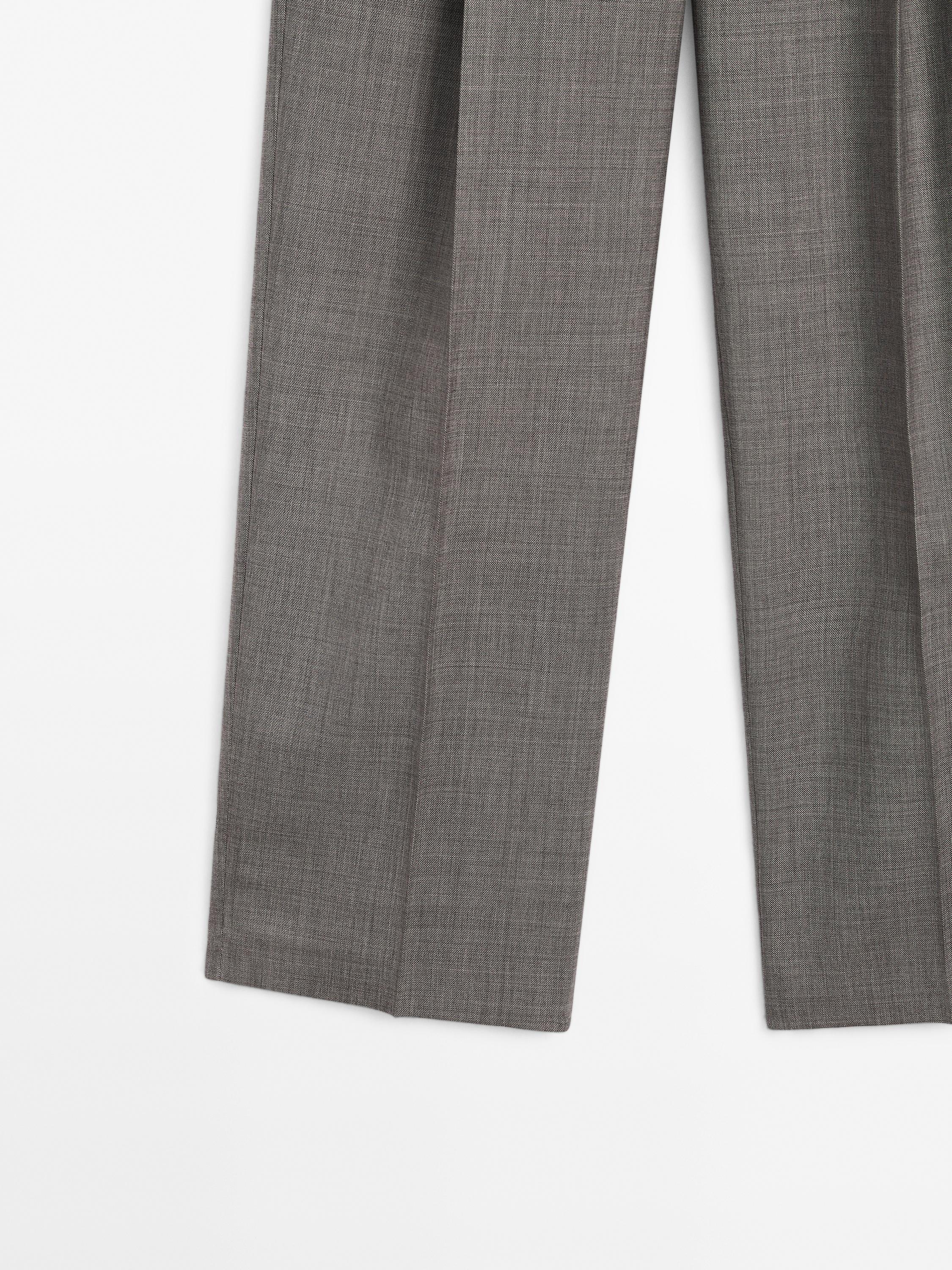 Pantalon chiné plissé en laine mélangée