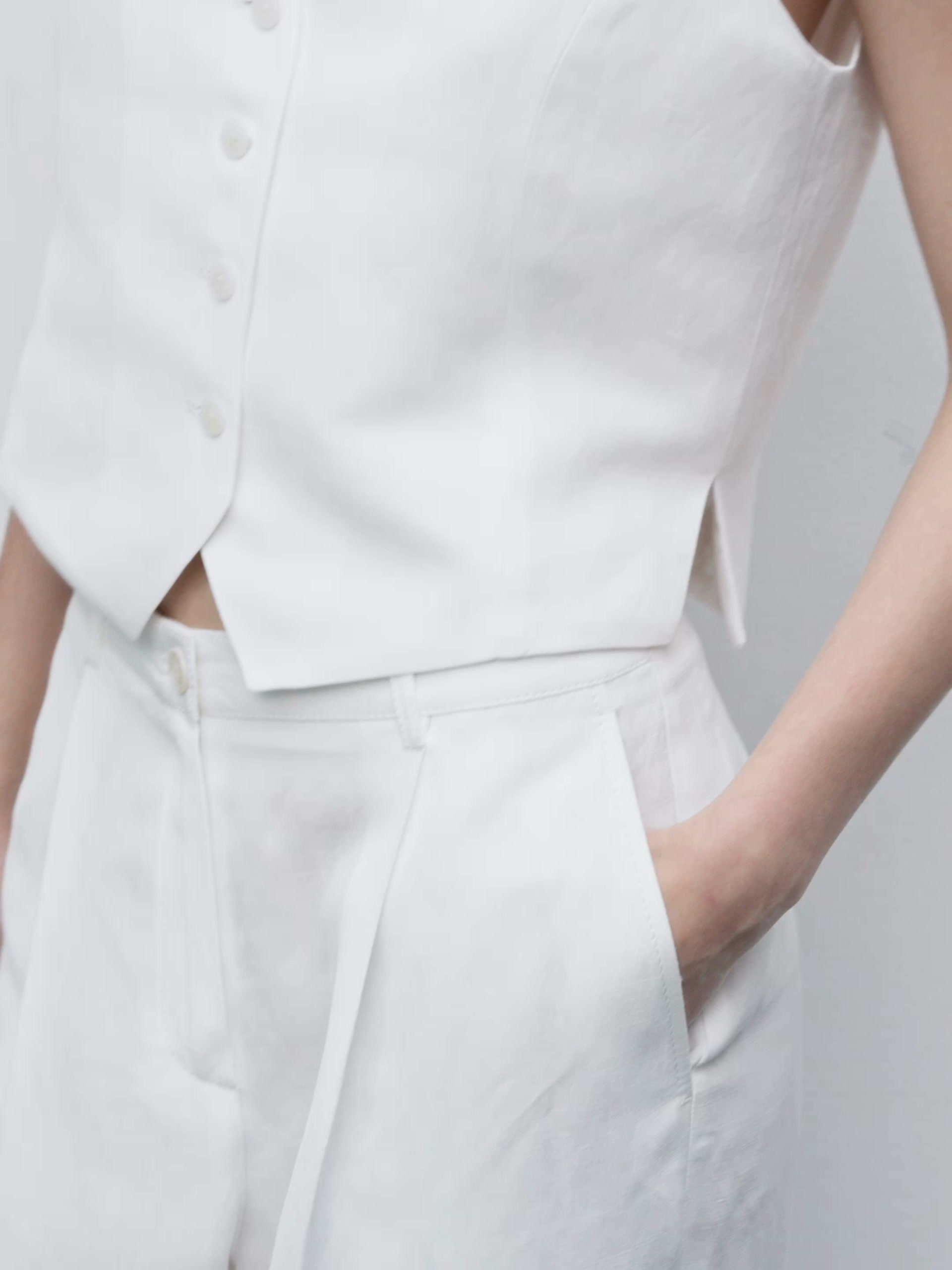 Linen blend trousers with buckle detail