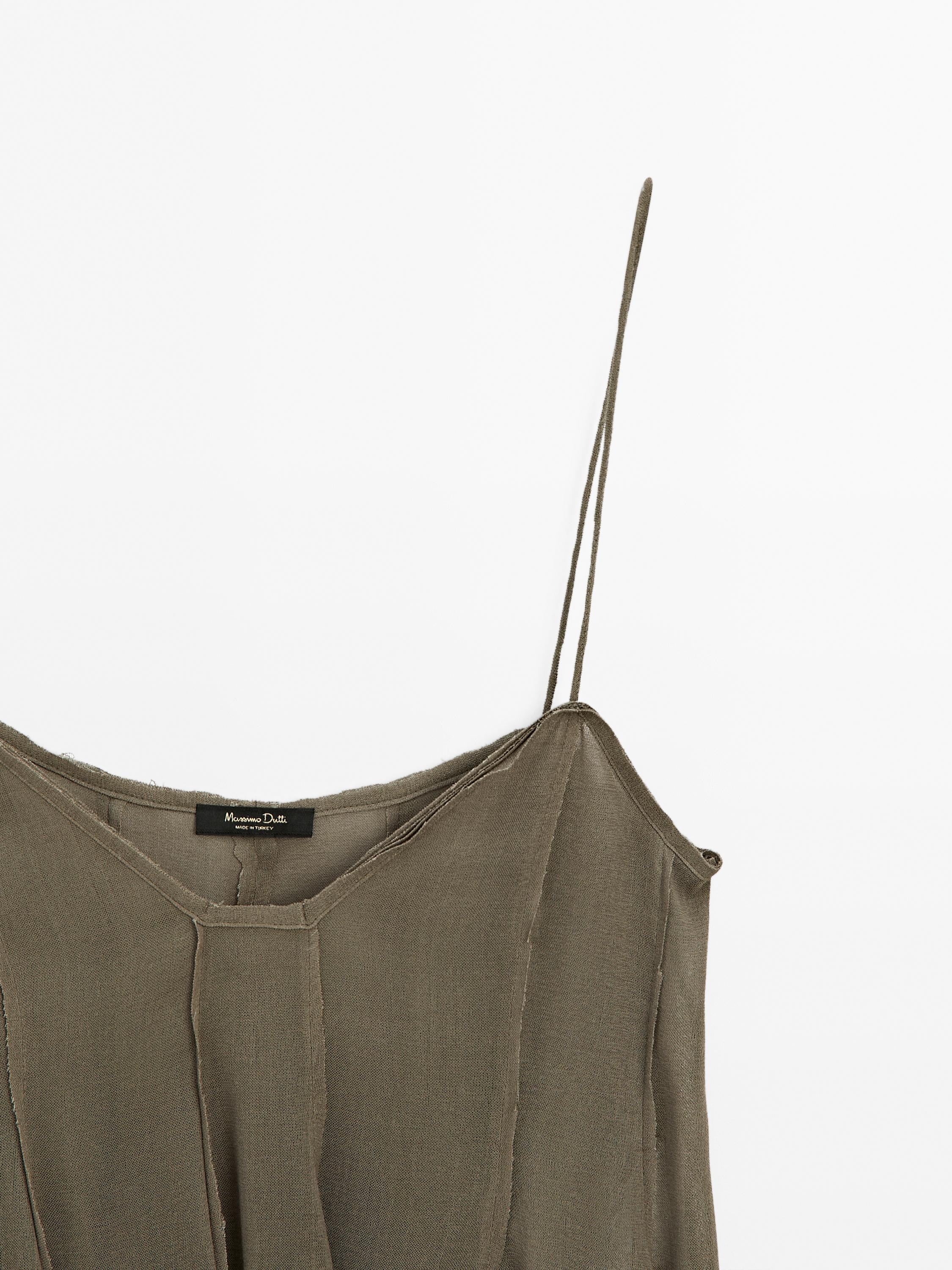 Flowing flared strappy top