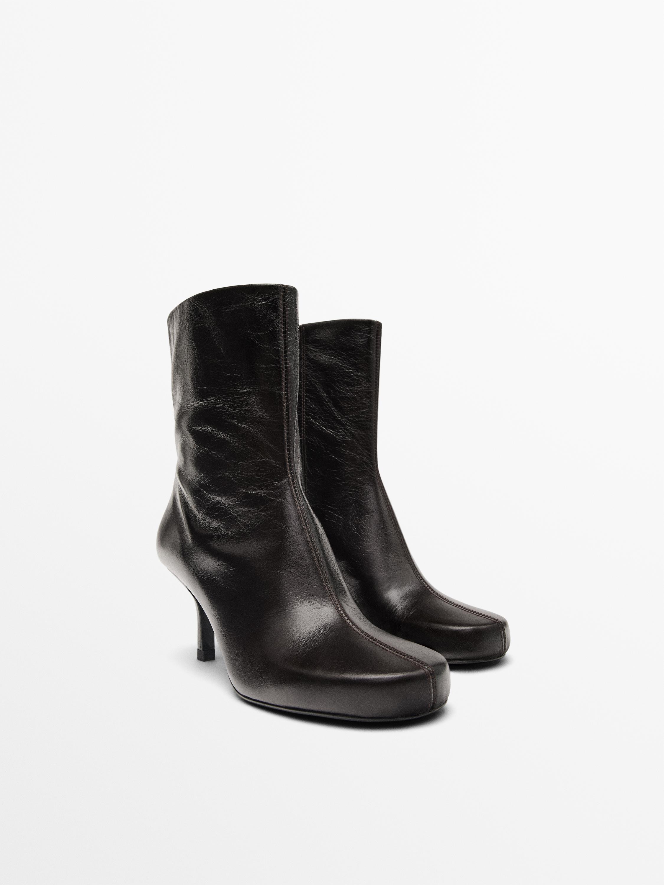 Bottines à talon en cuir brillant