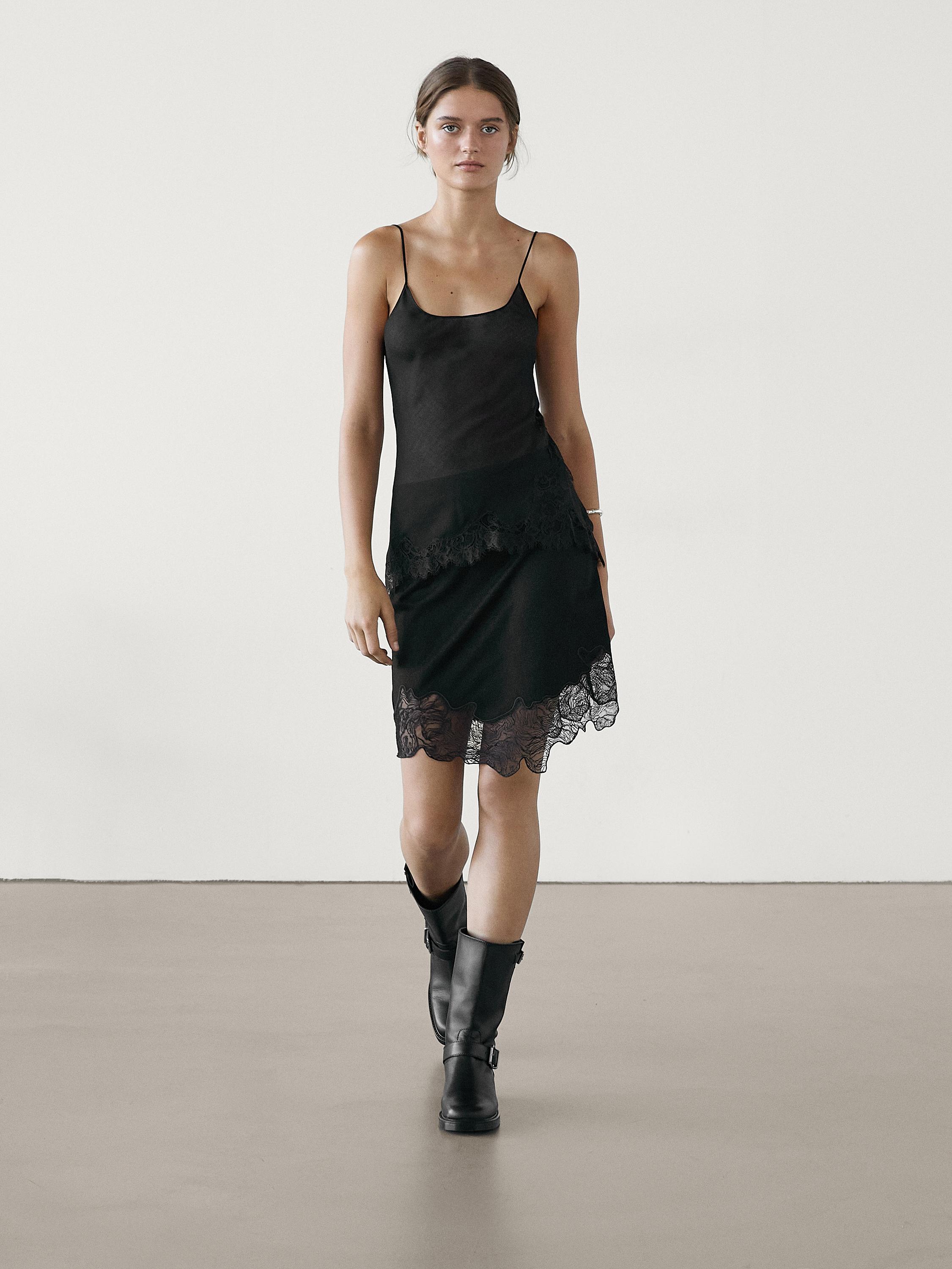 Short asymmetric lace-trimmed skirt