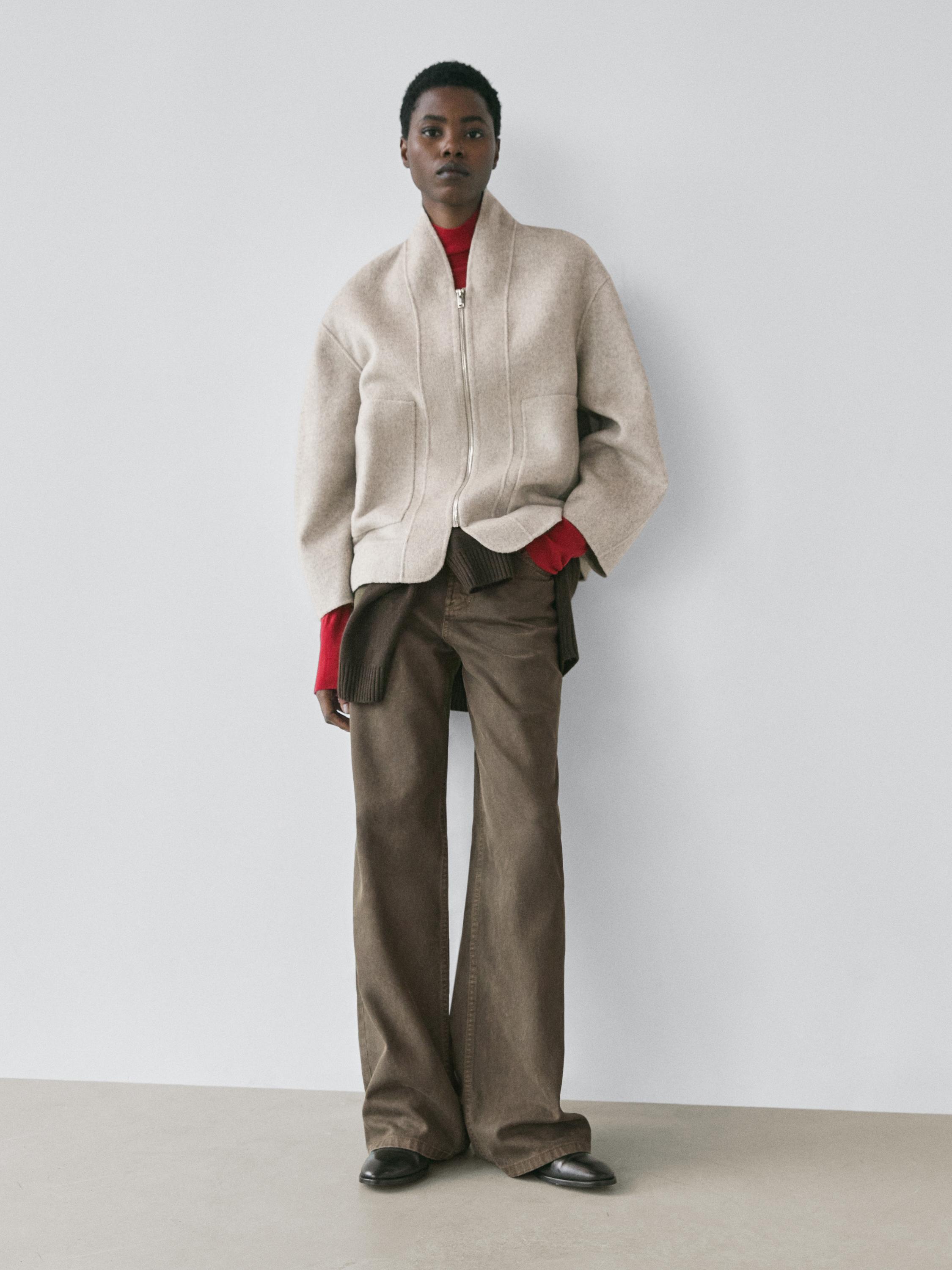 Kappa i ullblandning med dragkedja