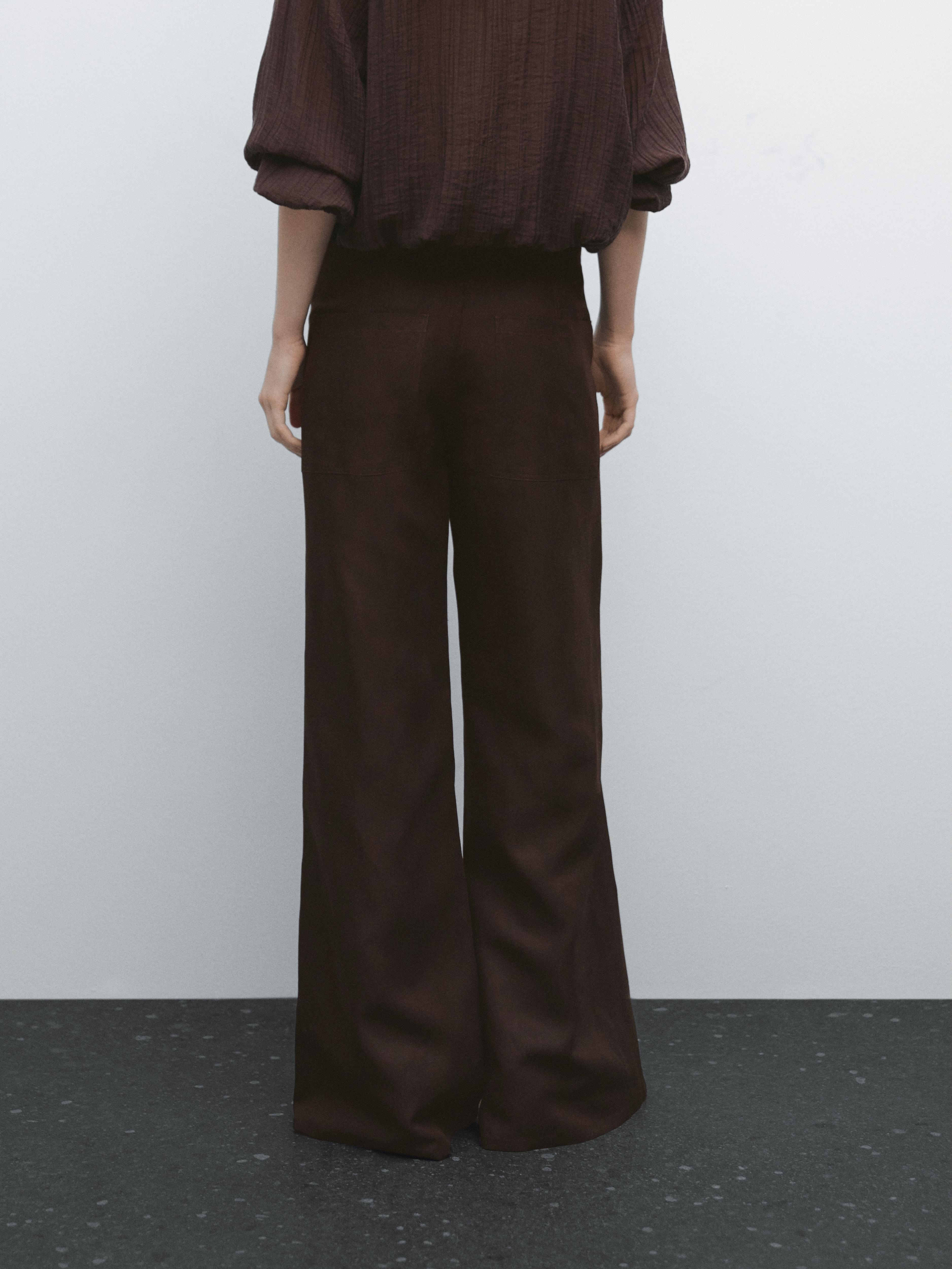 Flared trousers with seams