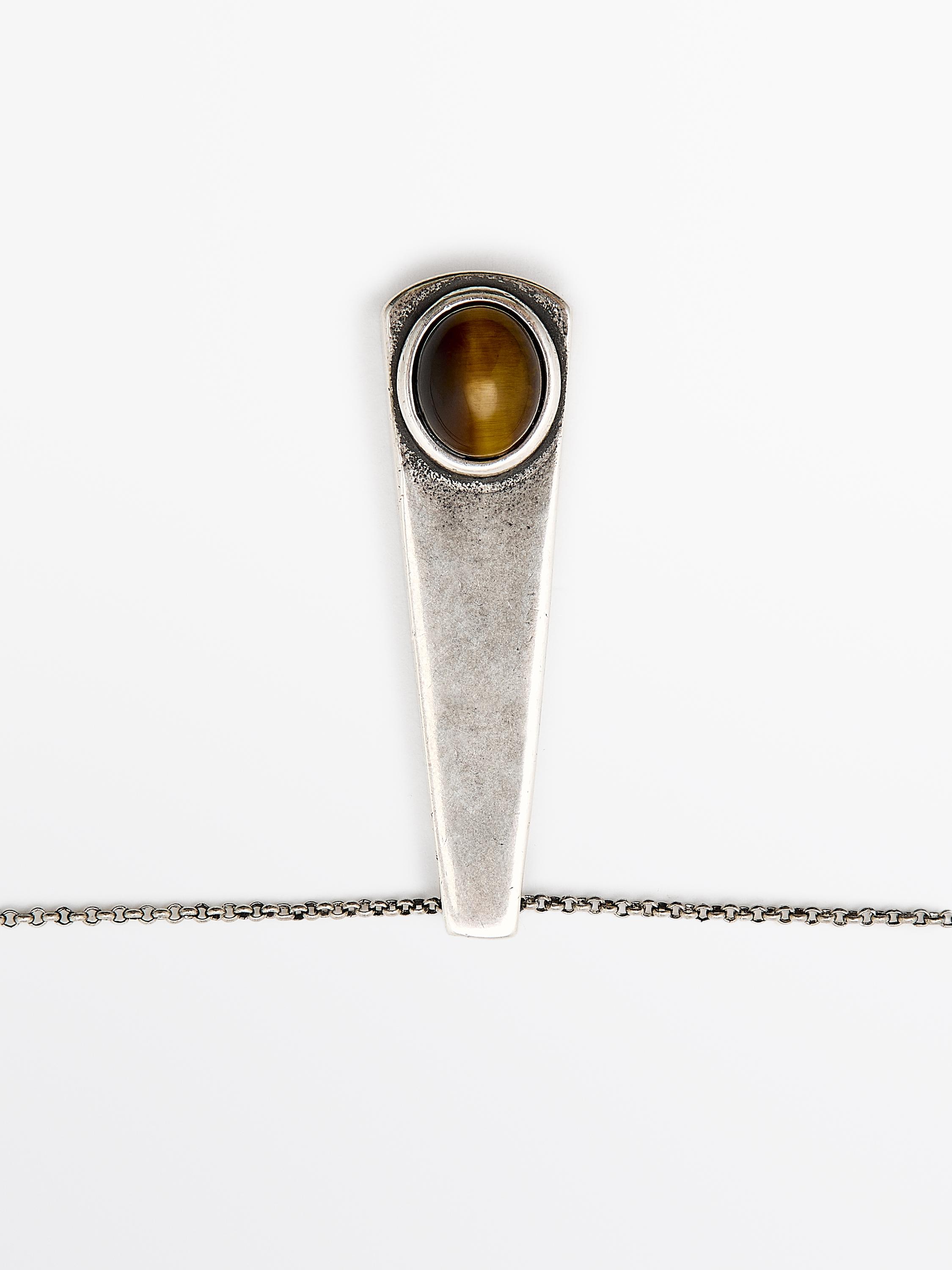 Geometric pendant with stone
