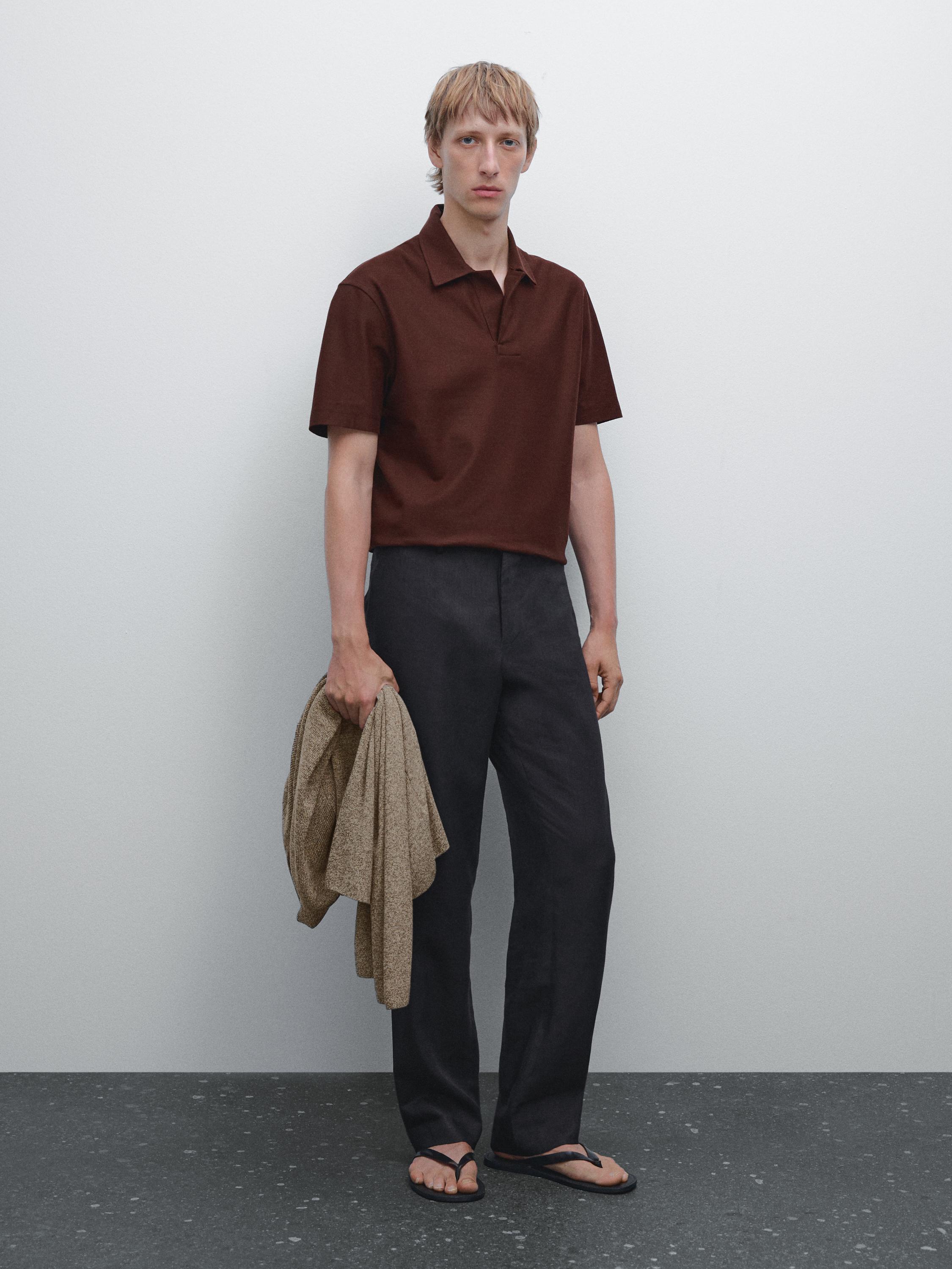 Textured polo shirt with hidden button