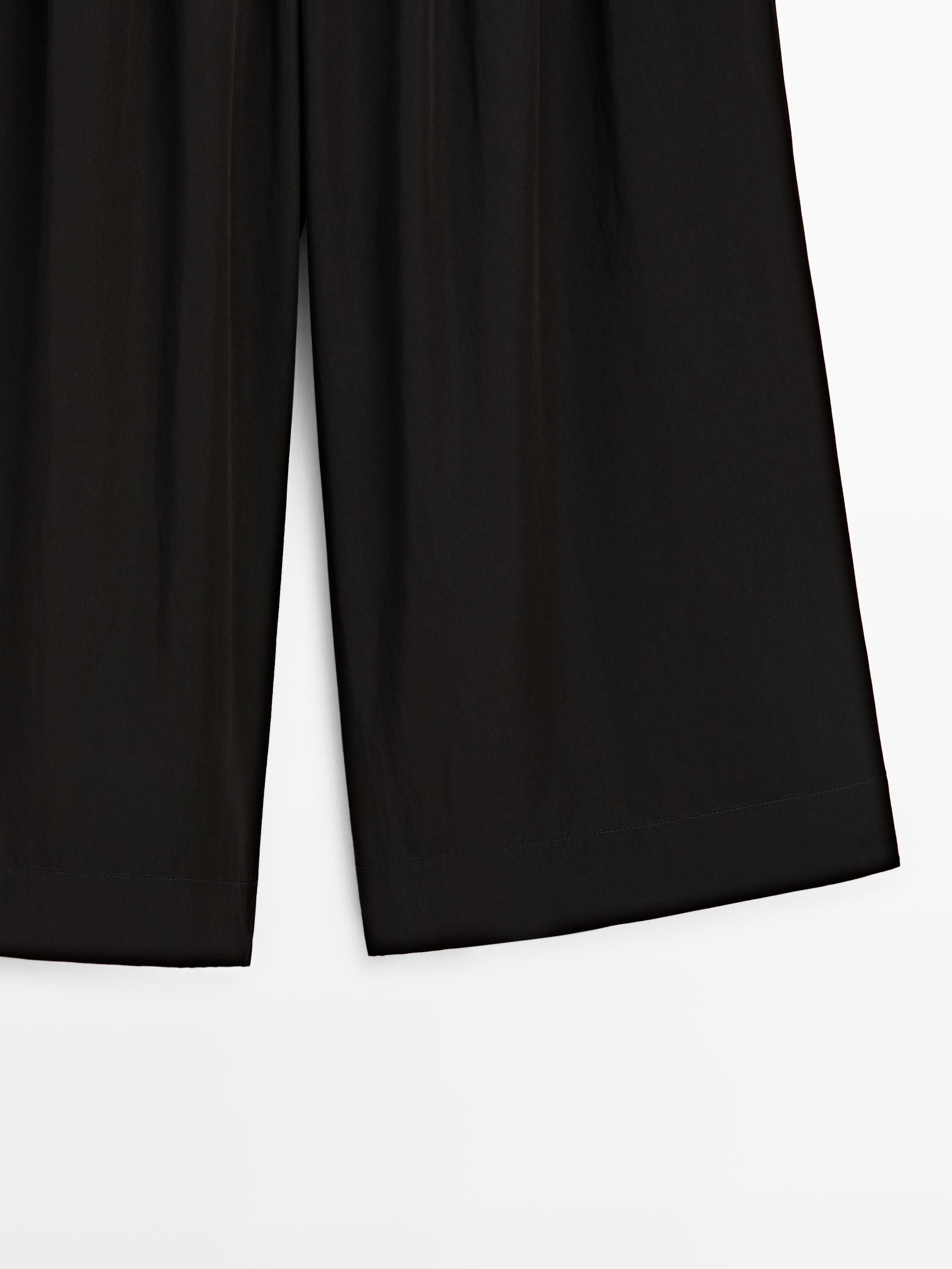 Flowing wide-leg pants — BLACK
