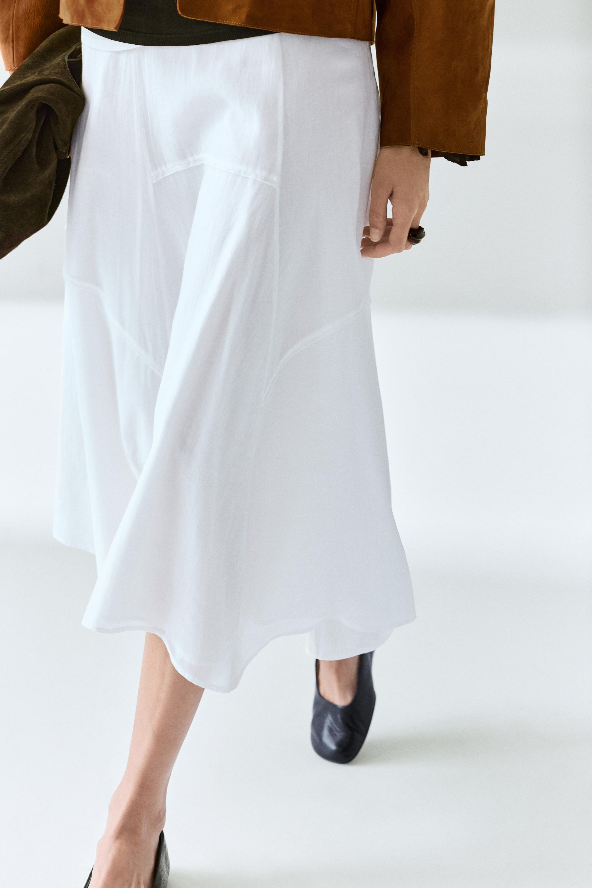 Flowing midi skirt with panel detail — WHITE