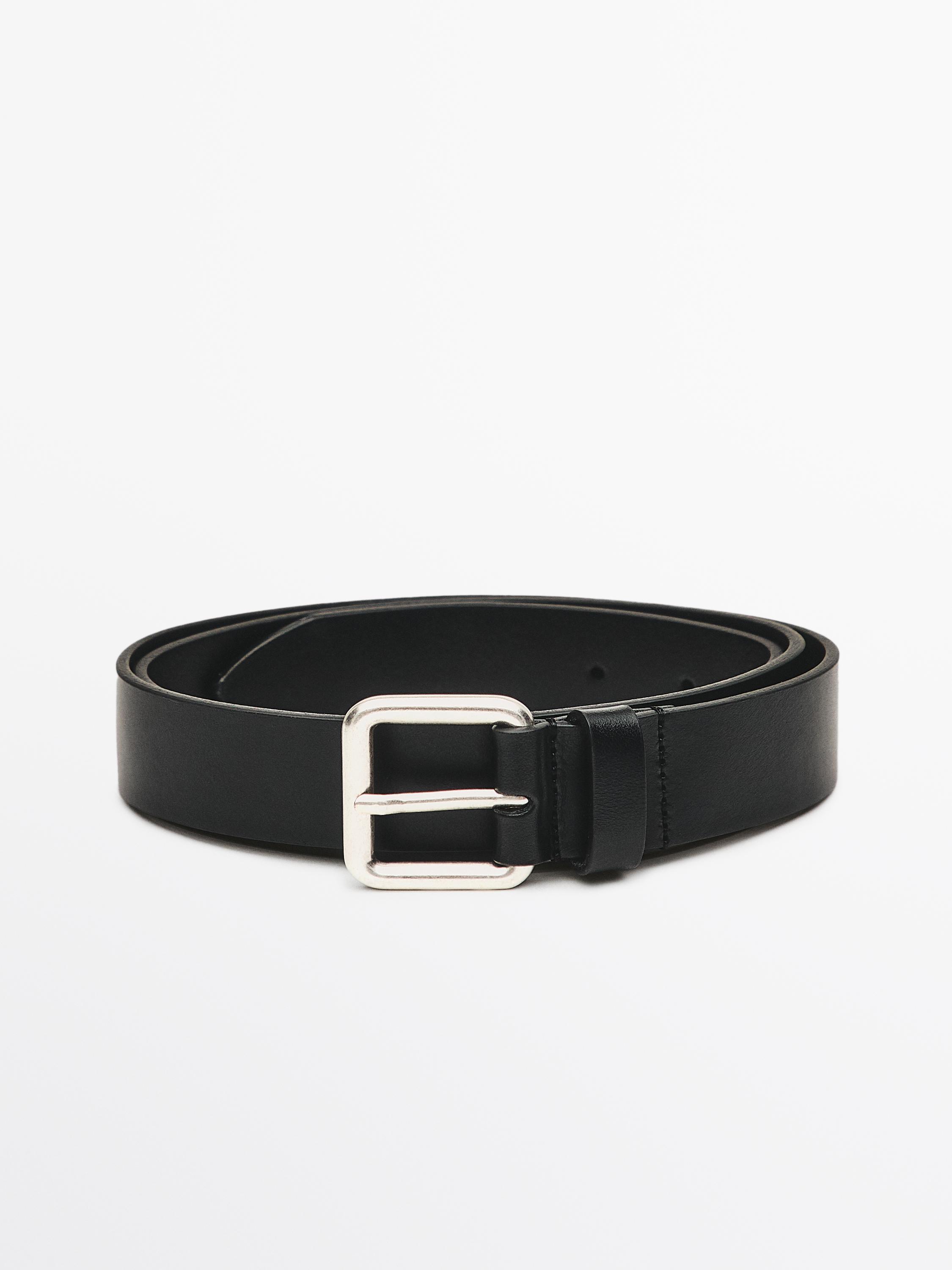 Leather belt with metallic buckle