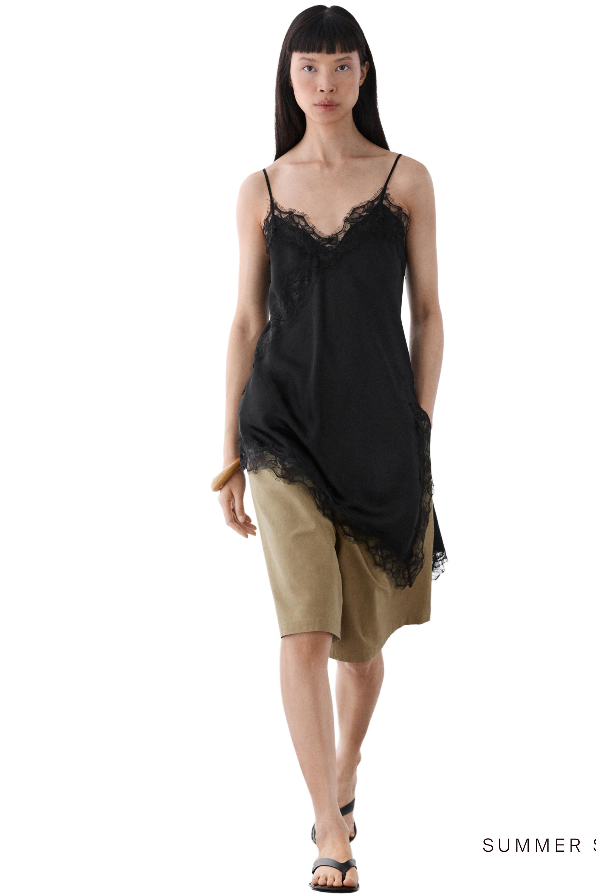 Asymmetric thin strap camisole top — BLACK