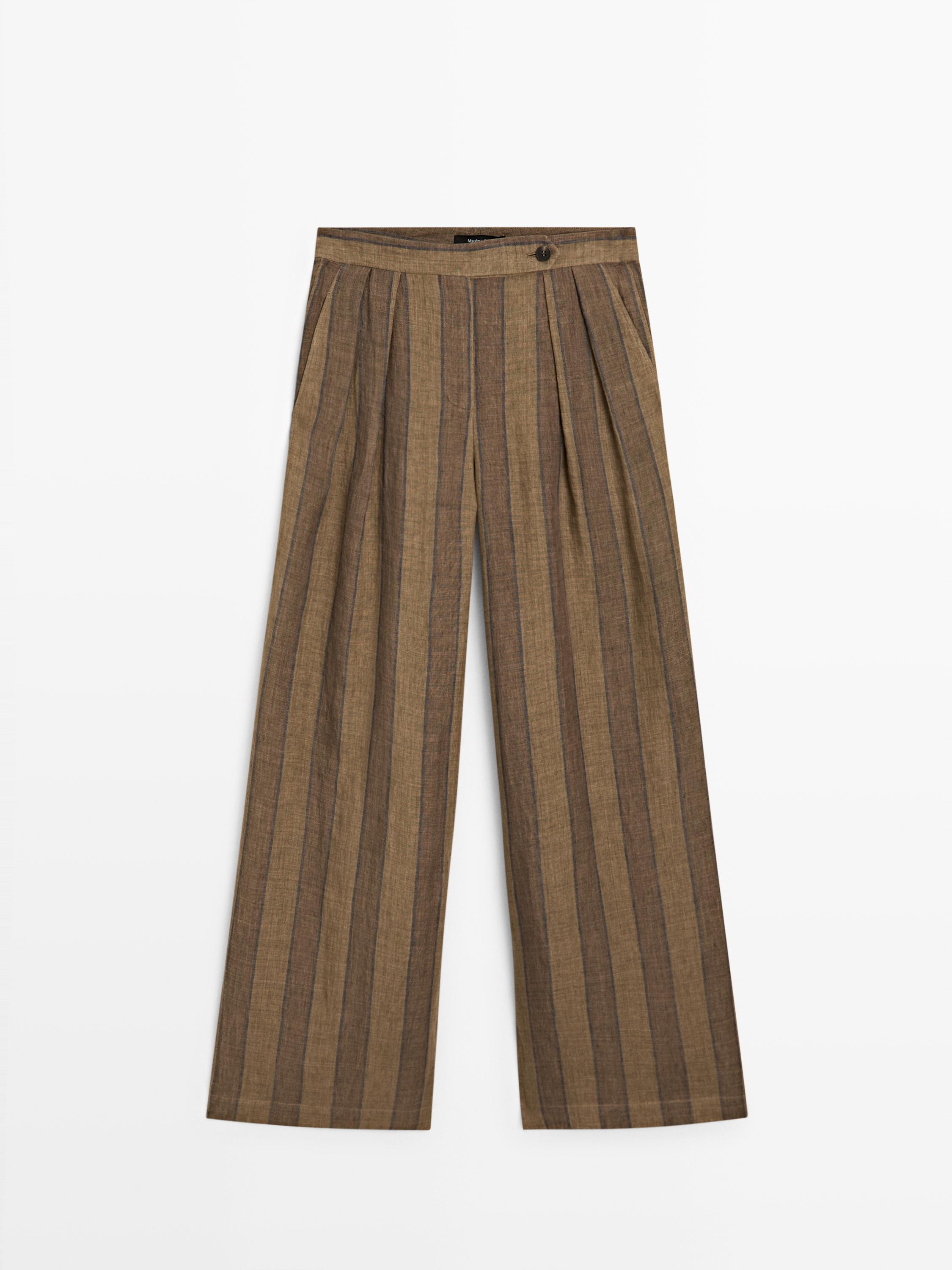 Kaki koloreko praken aurreko bista, marra bertikalekin, ebaki zabalarekin eta gerrian tolesturekin.