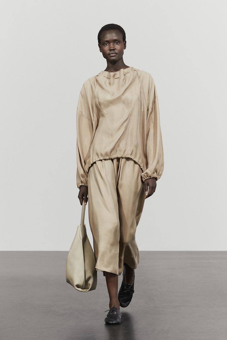 Flowing elastic waist midi skirt — SAND