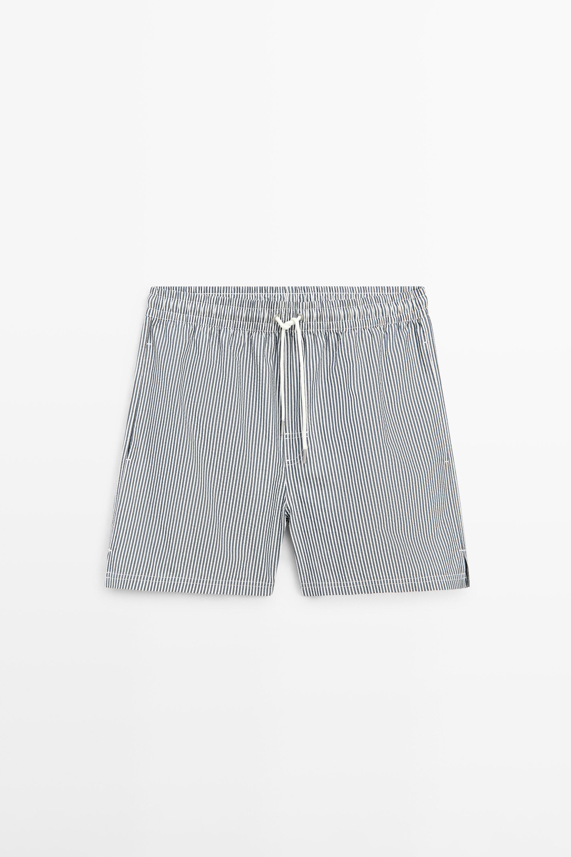 Swimming trunks with striped details — NAVY BLUE