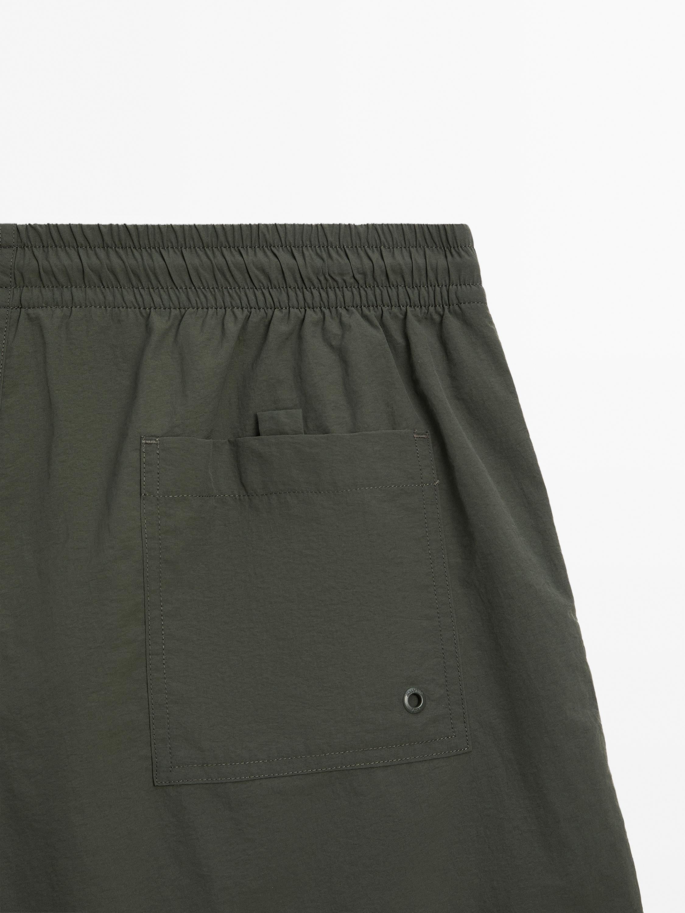Plain short fit swimming trunks