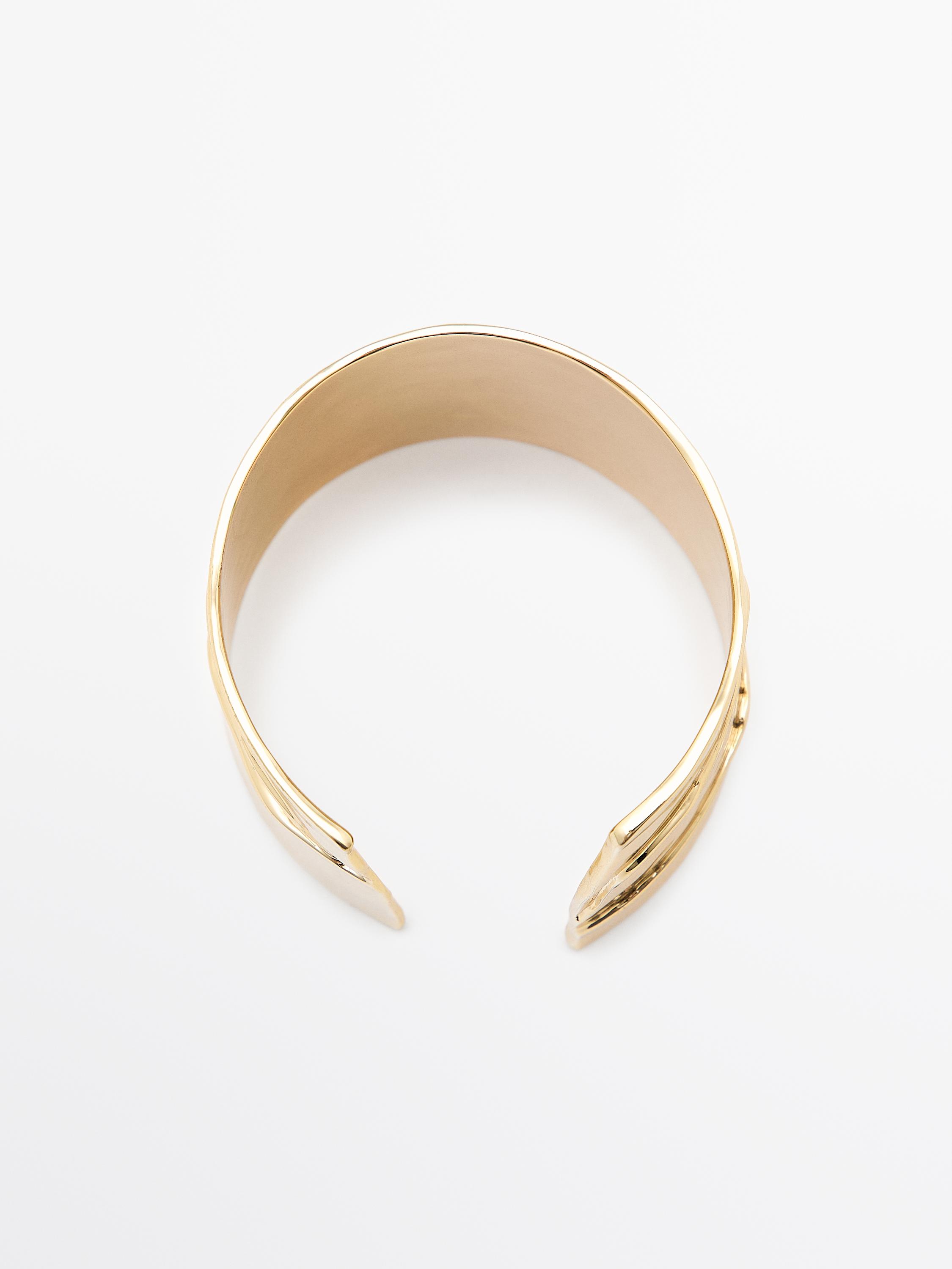 Brazalete metálico pliegue