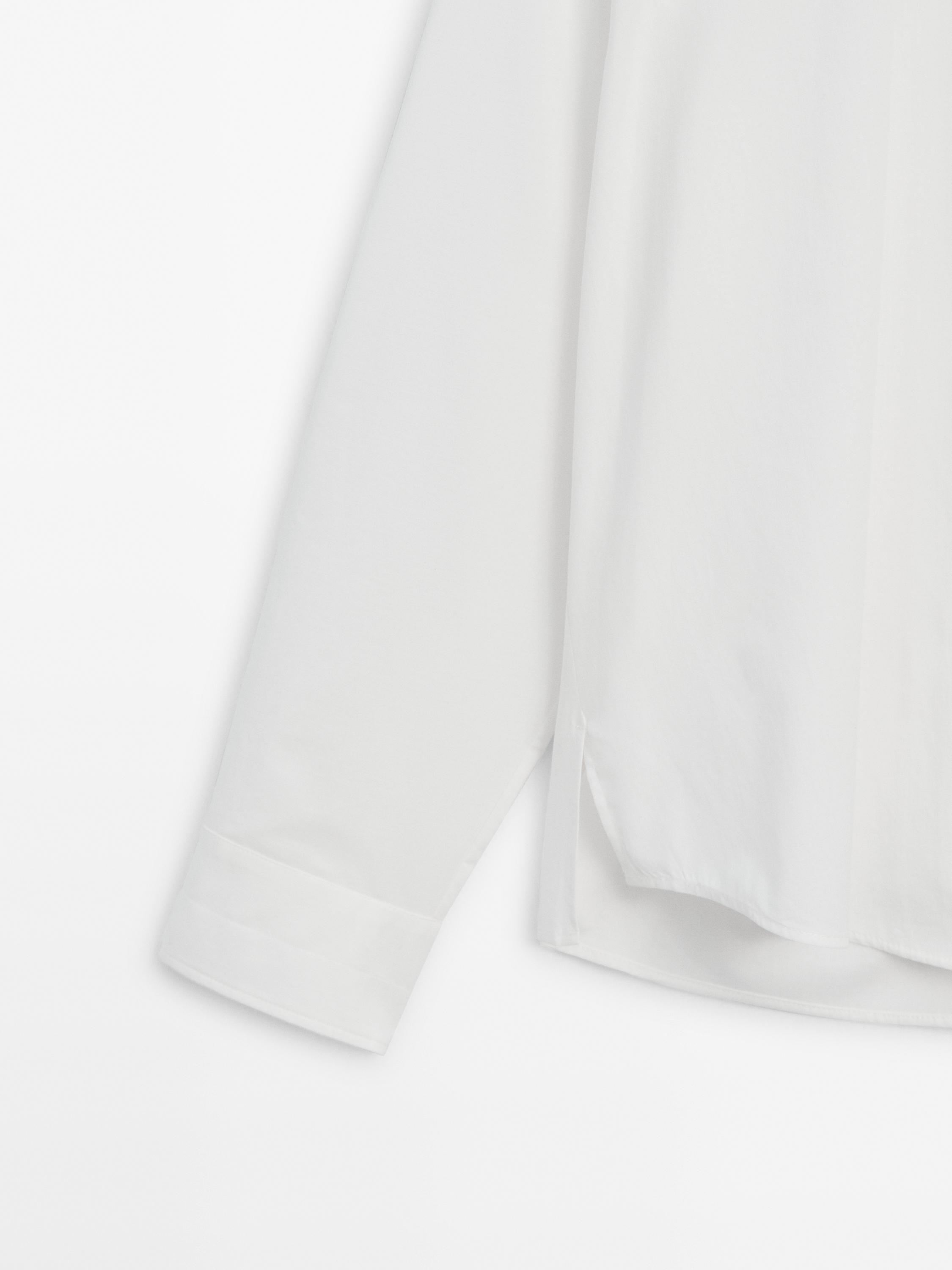 Poplin shirt with asymmetric hem