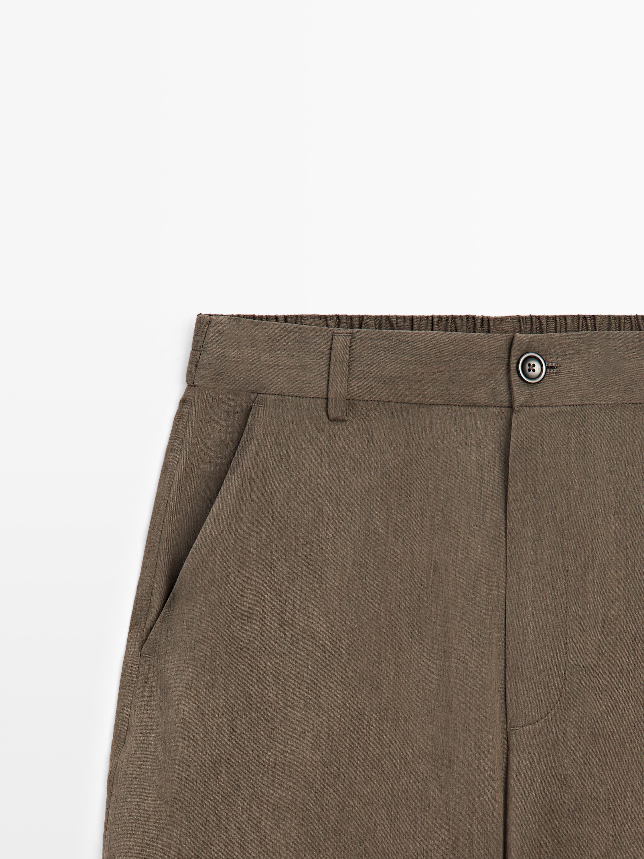 Flowing trousers with elasticated waistband — DARK GREEN
