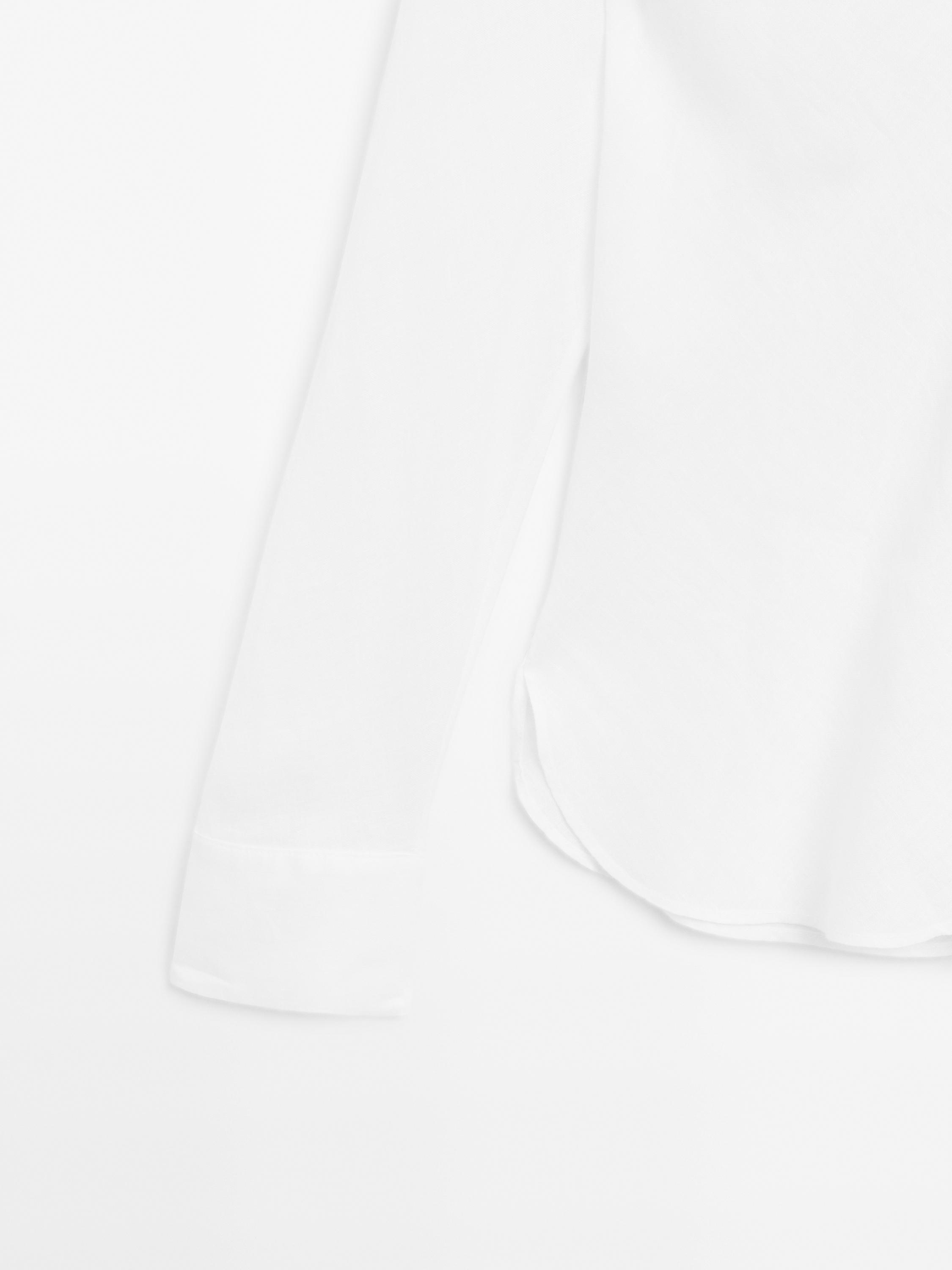 Flowing linen shirt with stand collar