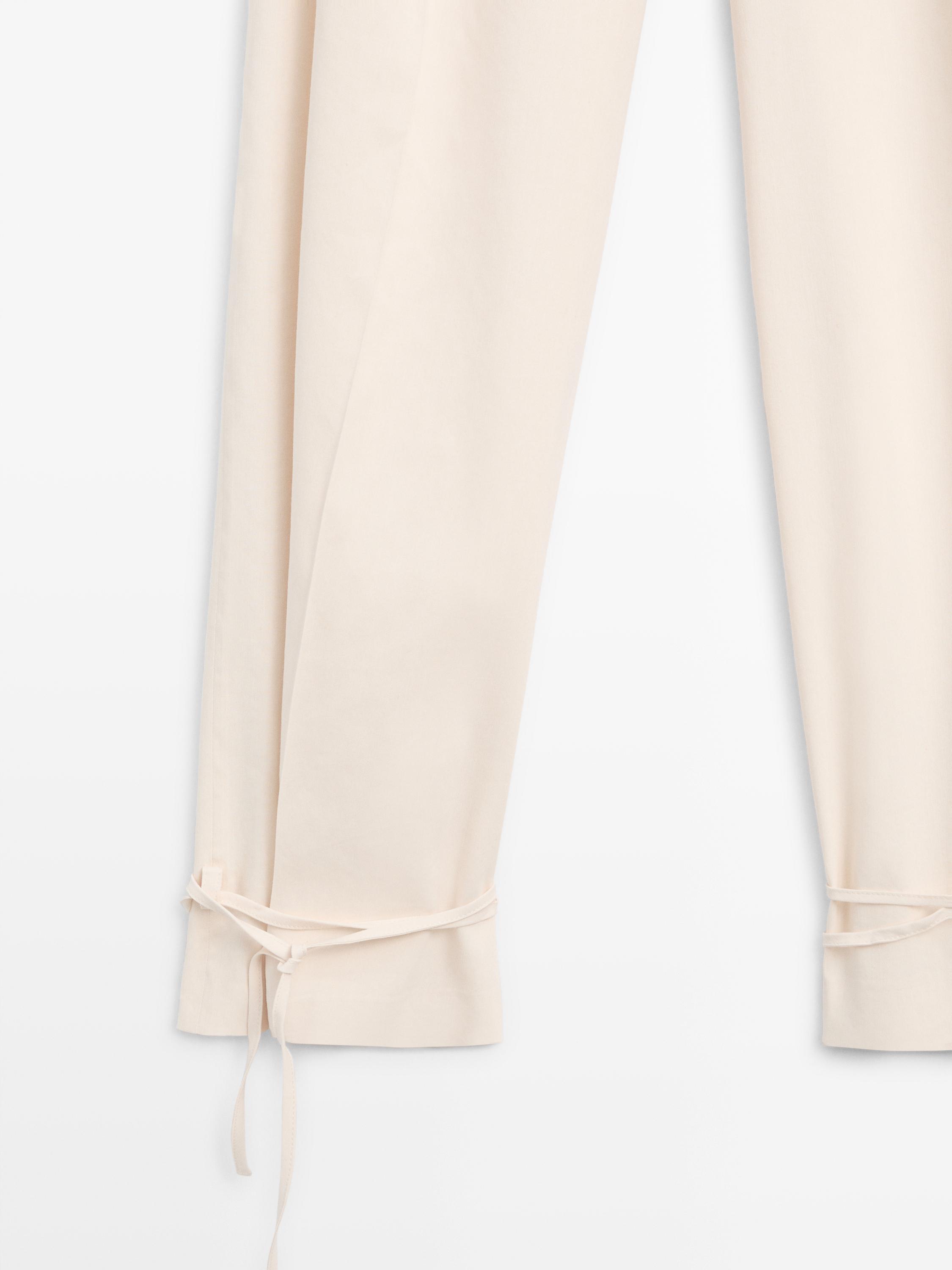Flowing barrel fit trousers — CREAM