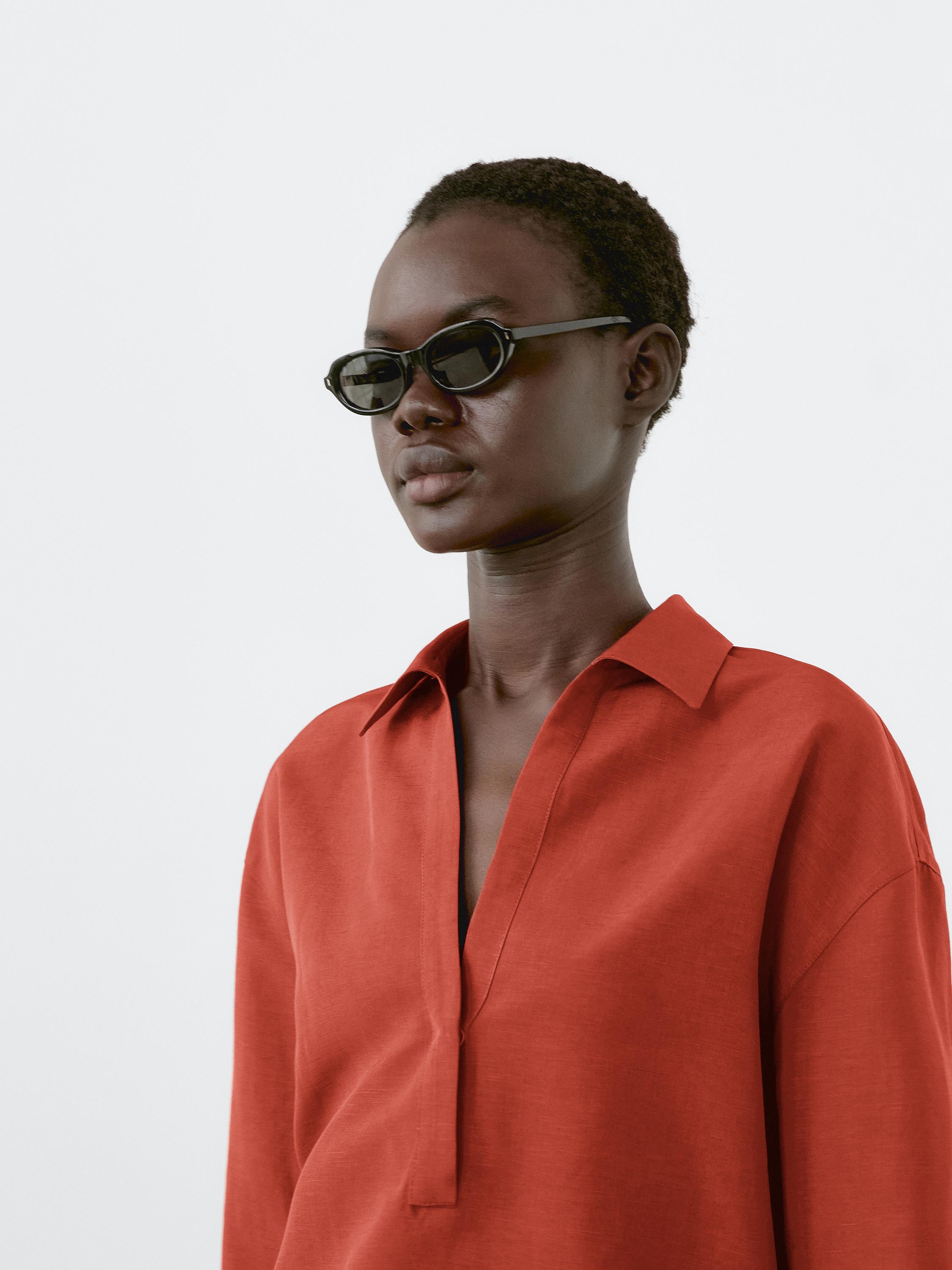 Blusa cuello polo con lino