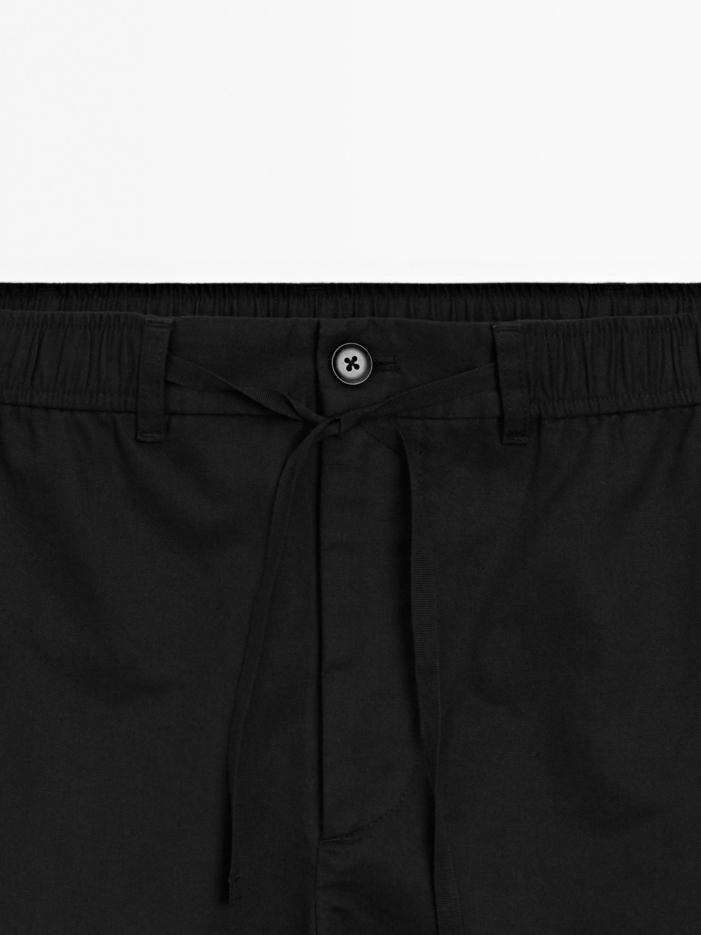 Quần jogger pha cốt-tông