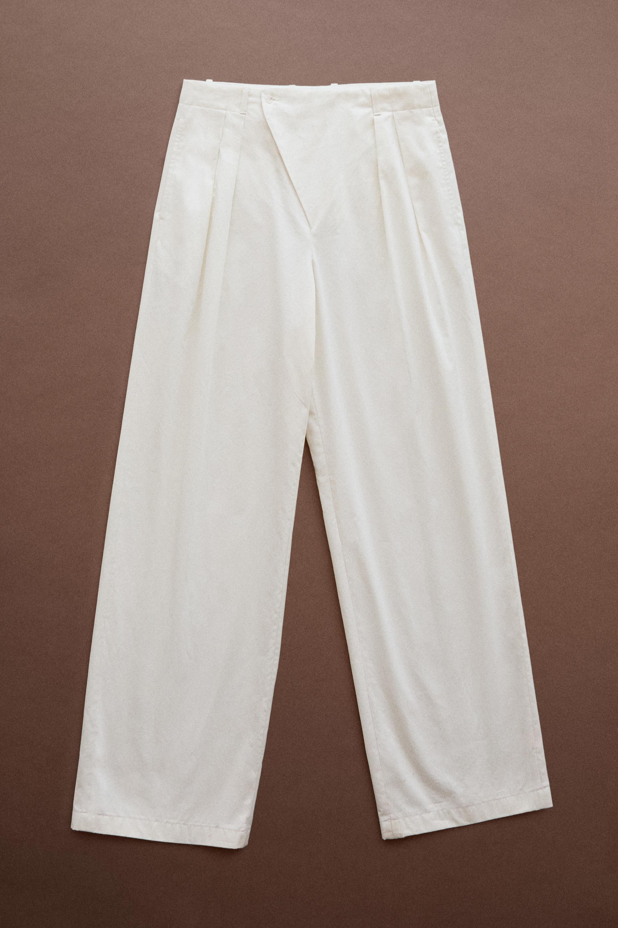 Pleated pants with crossover fastening detail - STUDIO — CREAM