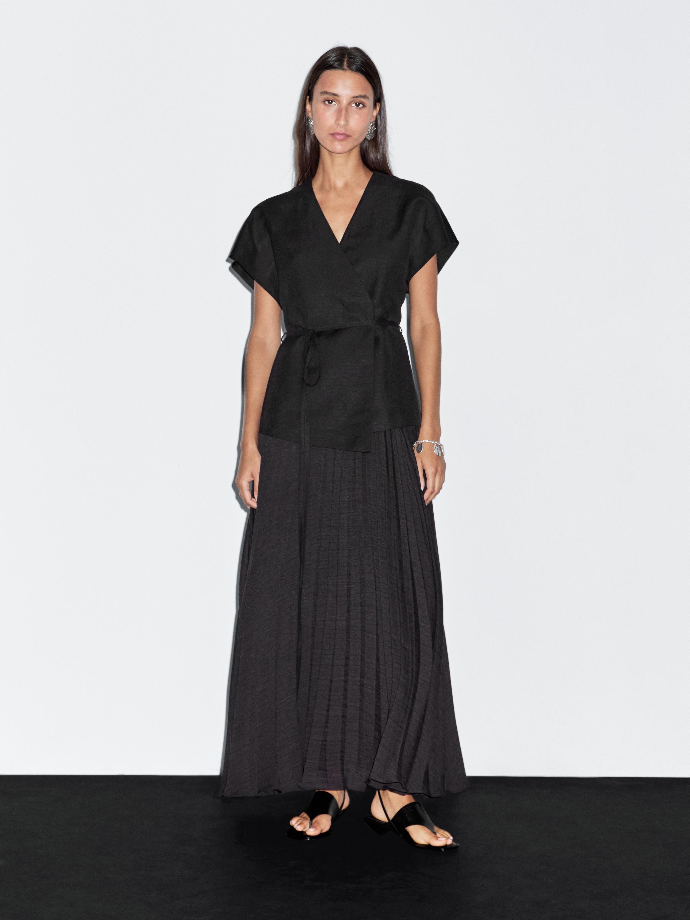 Long pleated dress with waistcoat detail