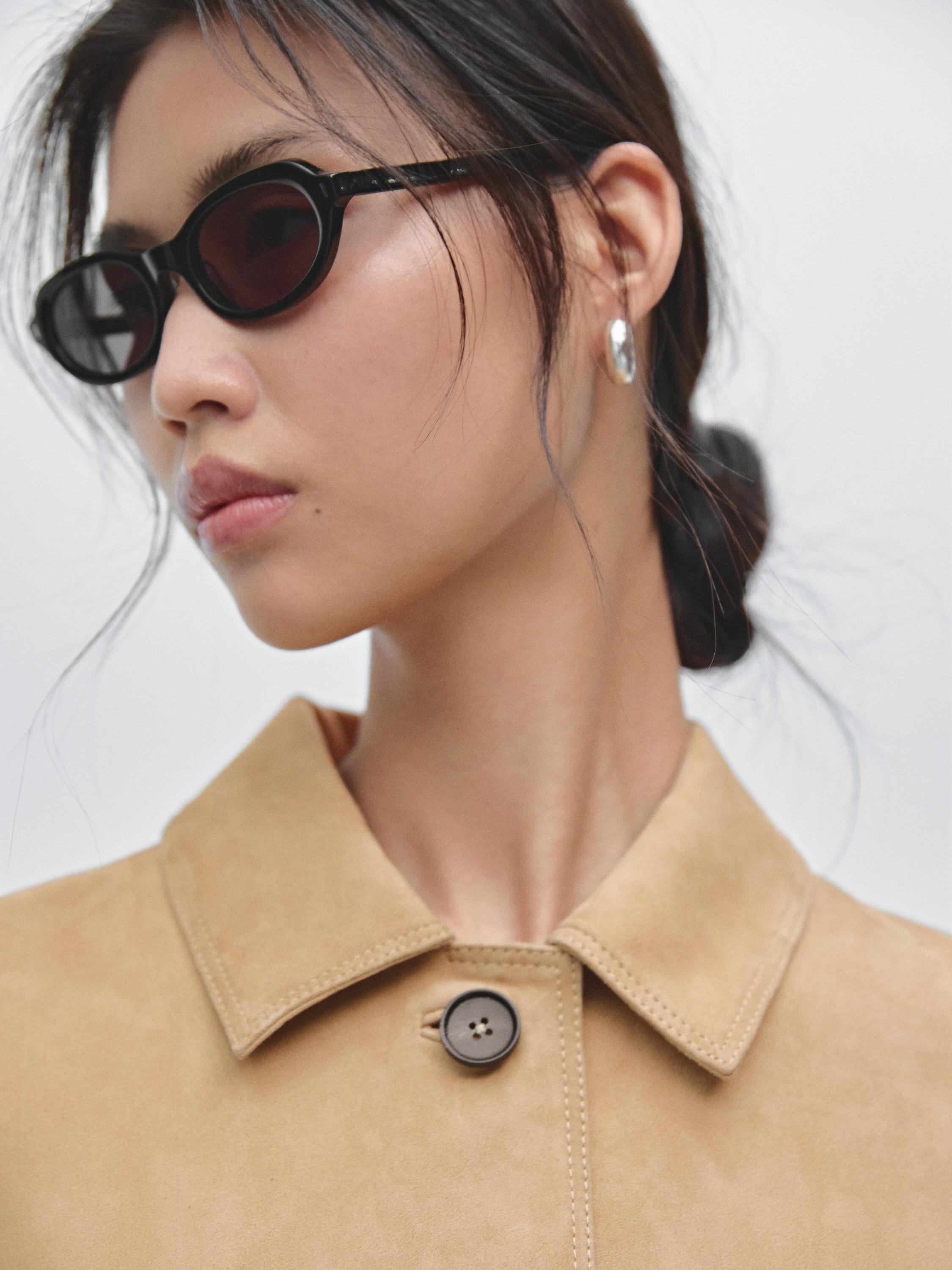 Short suede leather jacket with topstitching