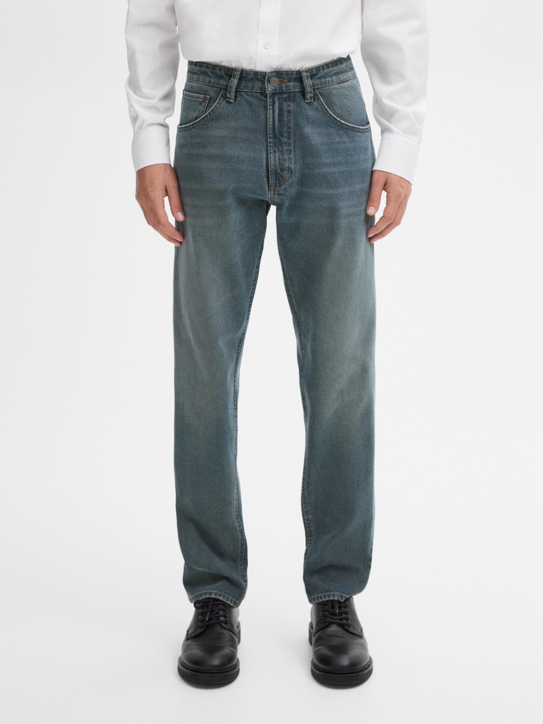 Coated relaxed fit jeans