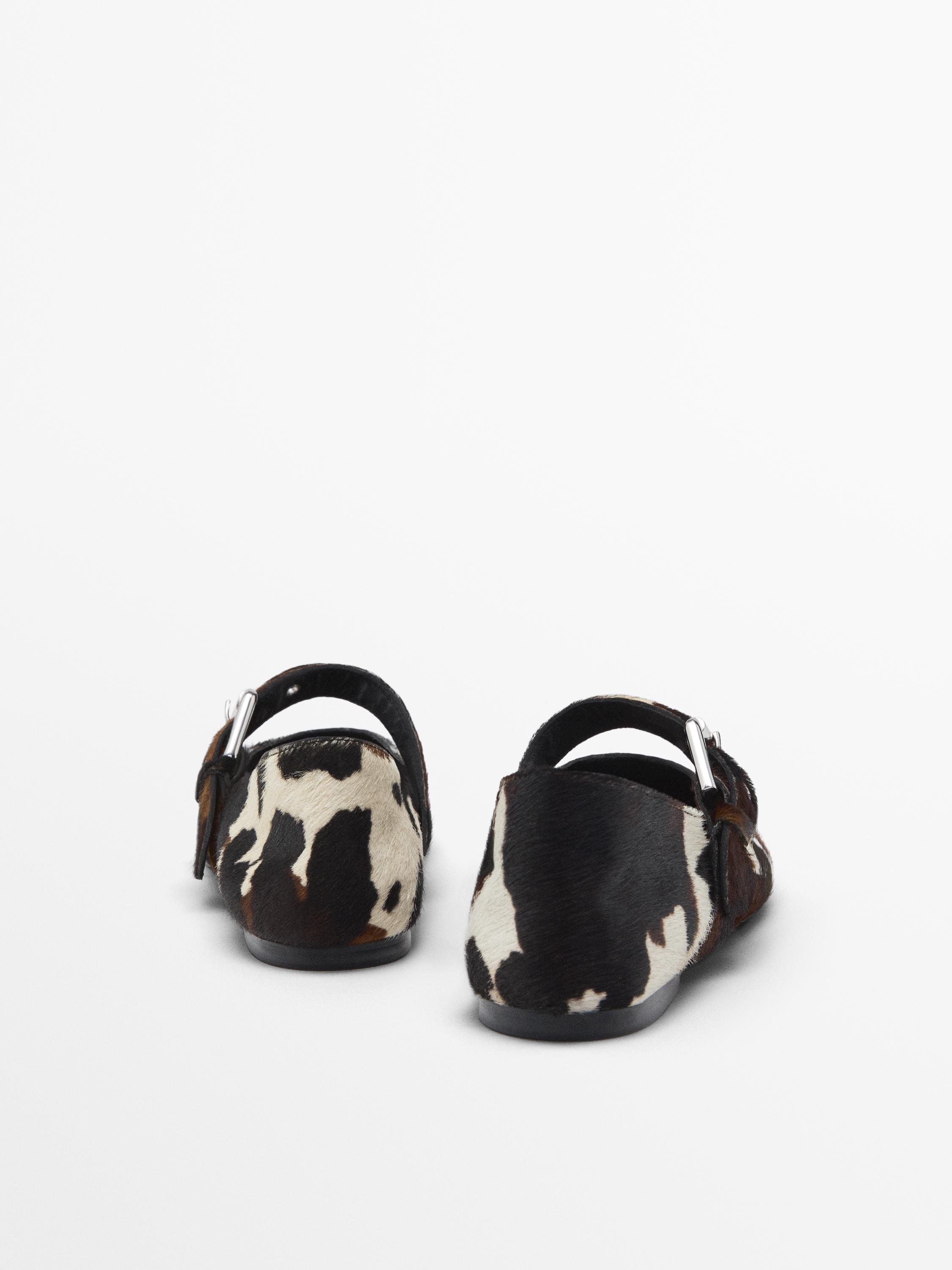 Animal print furskin ballet flats with buckle